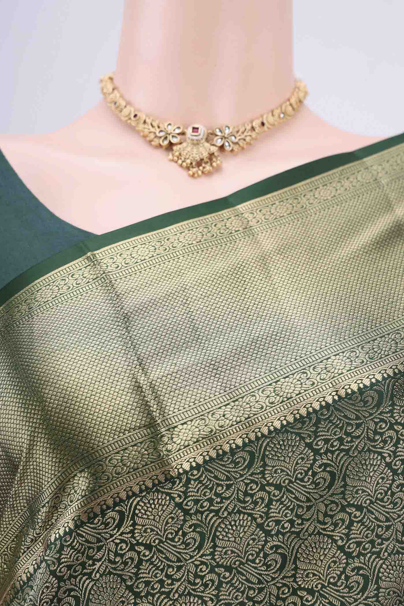 Border image of Bottle Green Soft Silk Saree with Zari Brocade on the body and Zari Border. 