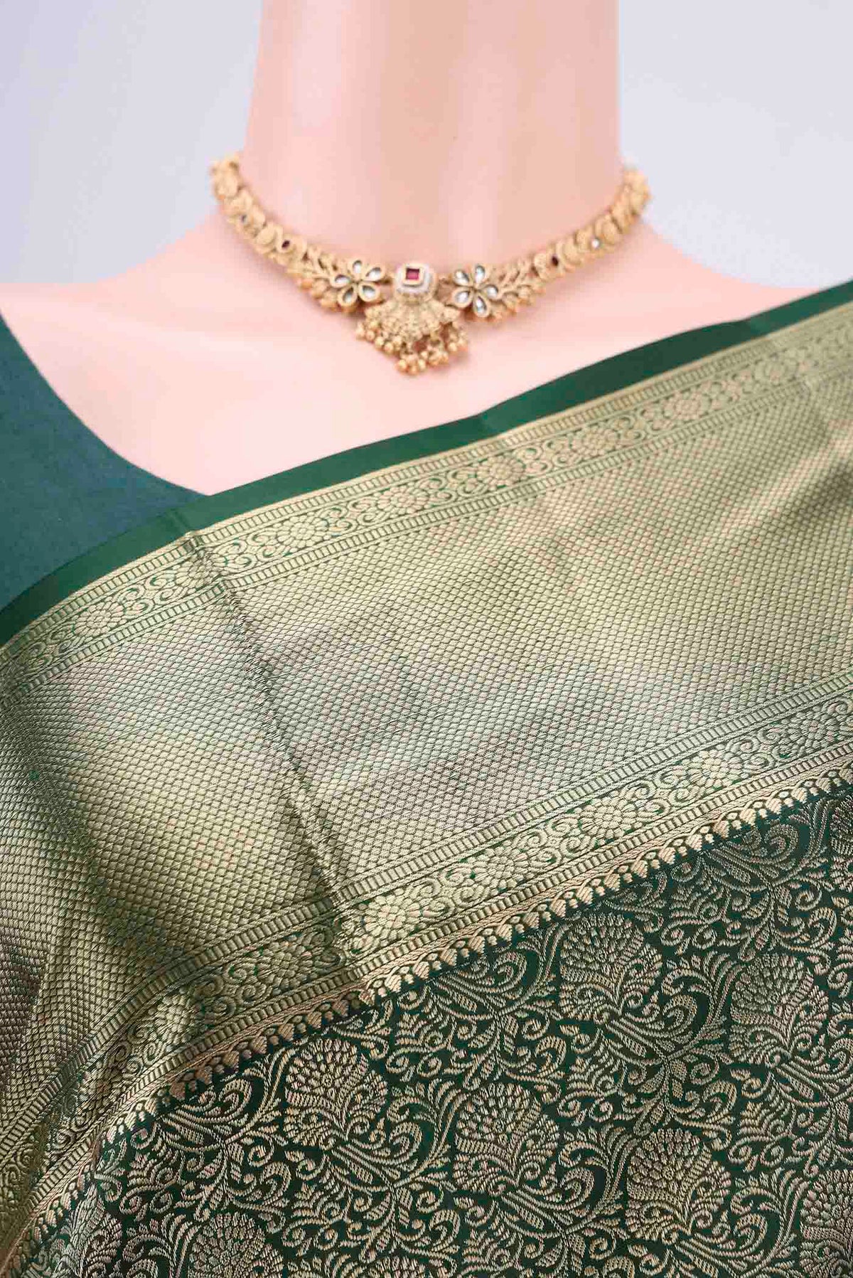 Border image of Bottle Green Soft Silk Saree with Zari Brocade on the body and Zari Border. 