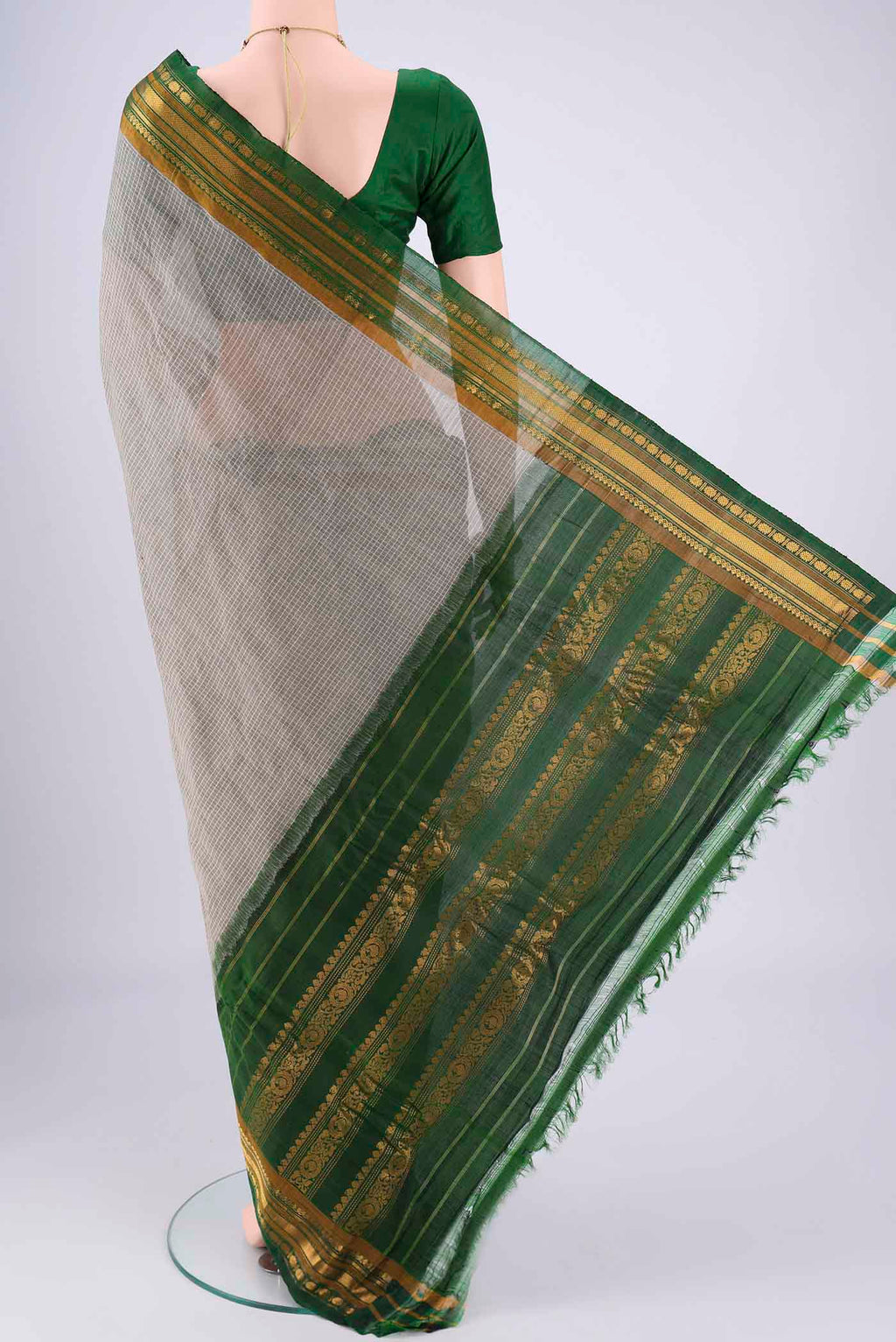 Flat view of Grey Gadwal cotton Saree with Checked design on the body and Zari Border. 