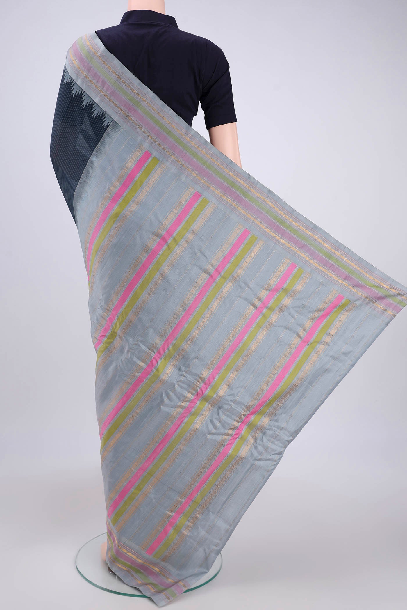 Flat view of Davys Grey Gadwal Silk Saree with Stripes on the body and Zari Border. 