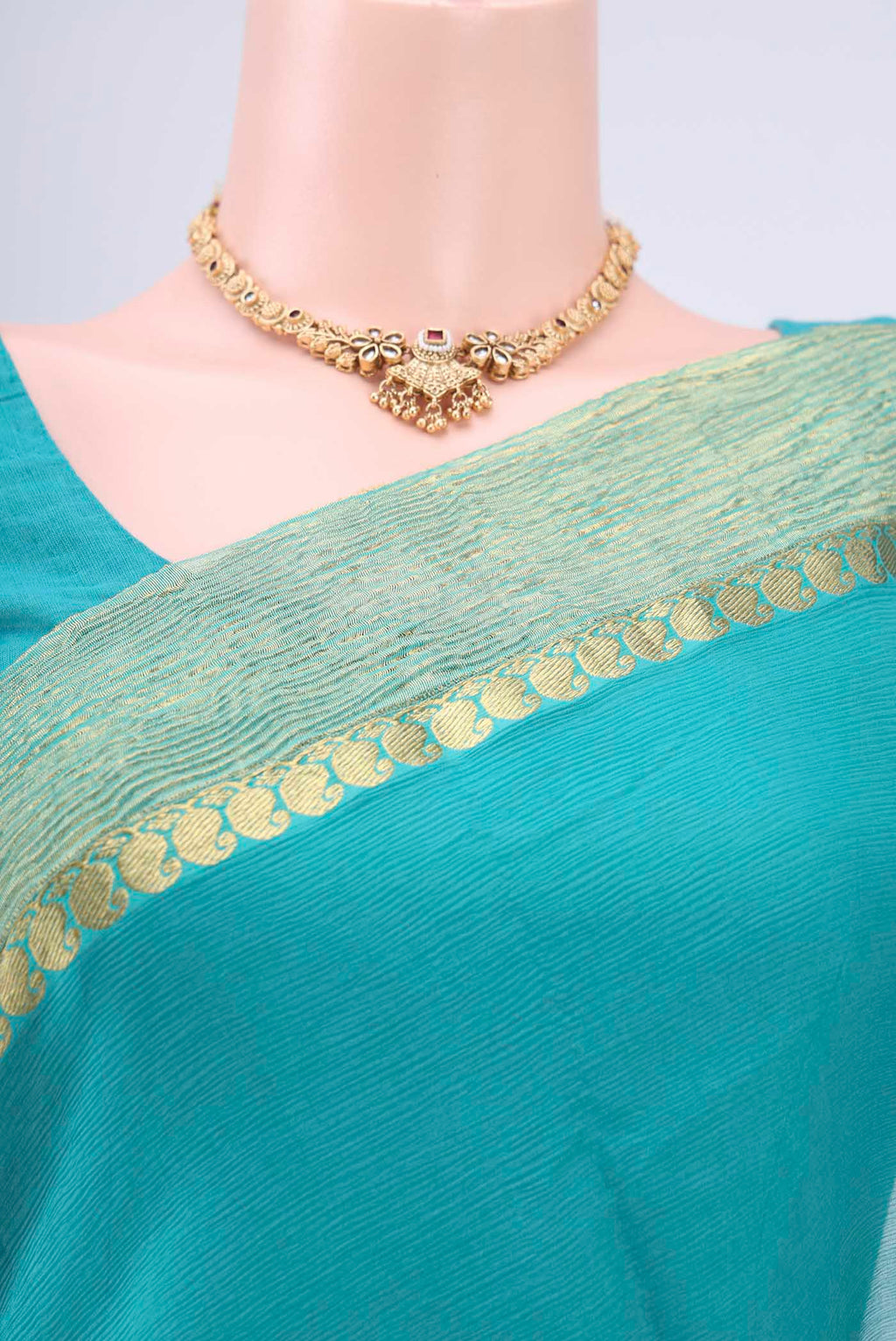 Border image of Sea Green Mysore Chiffon Saree with Plain Body and Zari Border. 