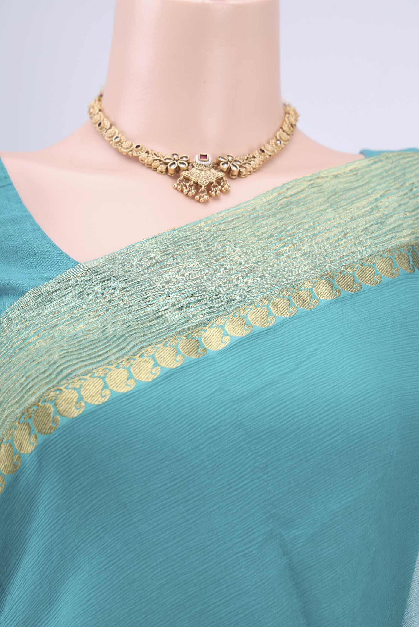 Border image of Sea Green Mysore Chiffon Saree with Plain Body and Zari Border. 
