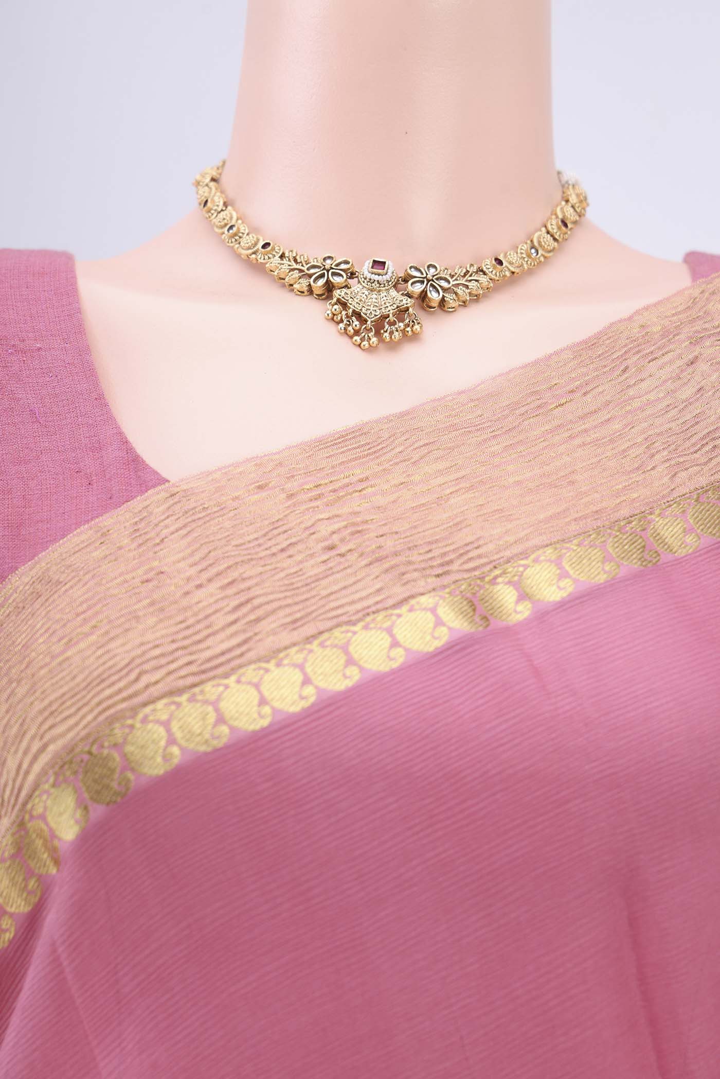 Border image of Peach Mysore Chiffon Saree with Half And Half on the body and Zari Border. 