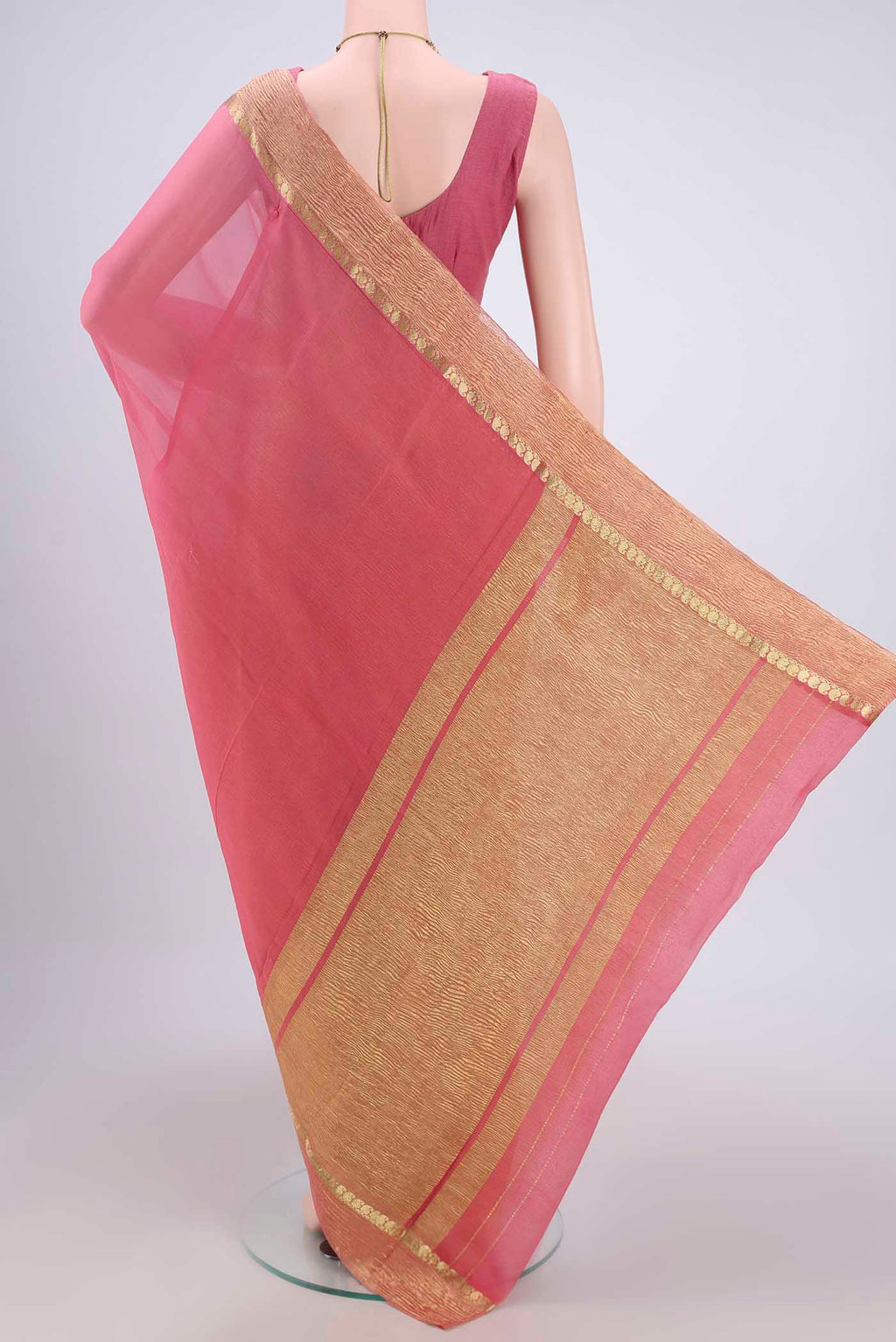 Flat view of Peach Mysore Chiffon Saree with Half And Half on the body and Zari Border. 
