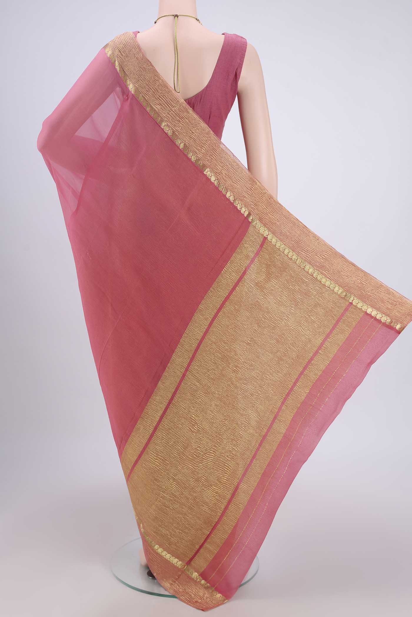Flat view of Peach Mysore Chiffon Saree with Half And Half on the body and Zari Border. 