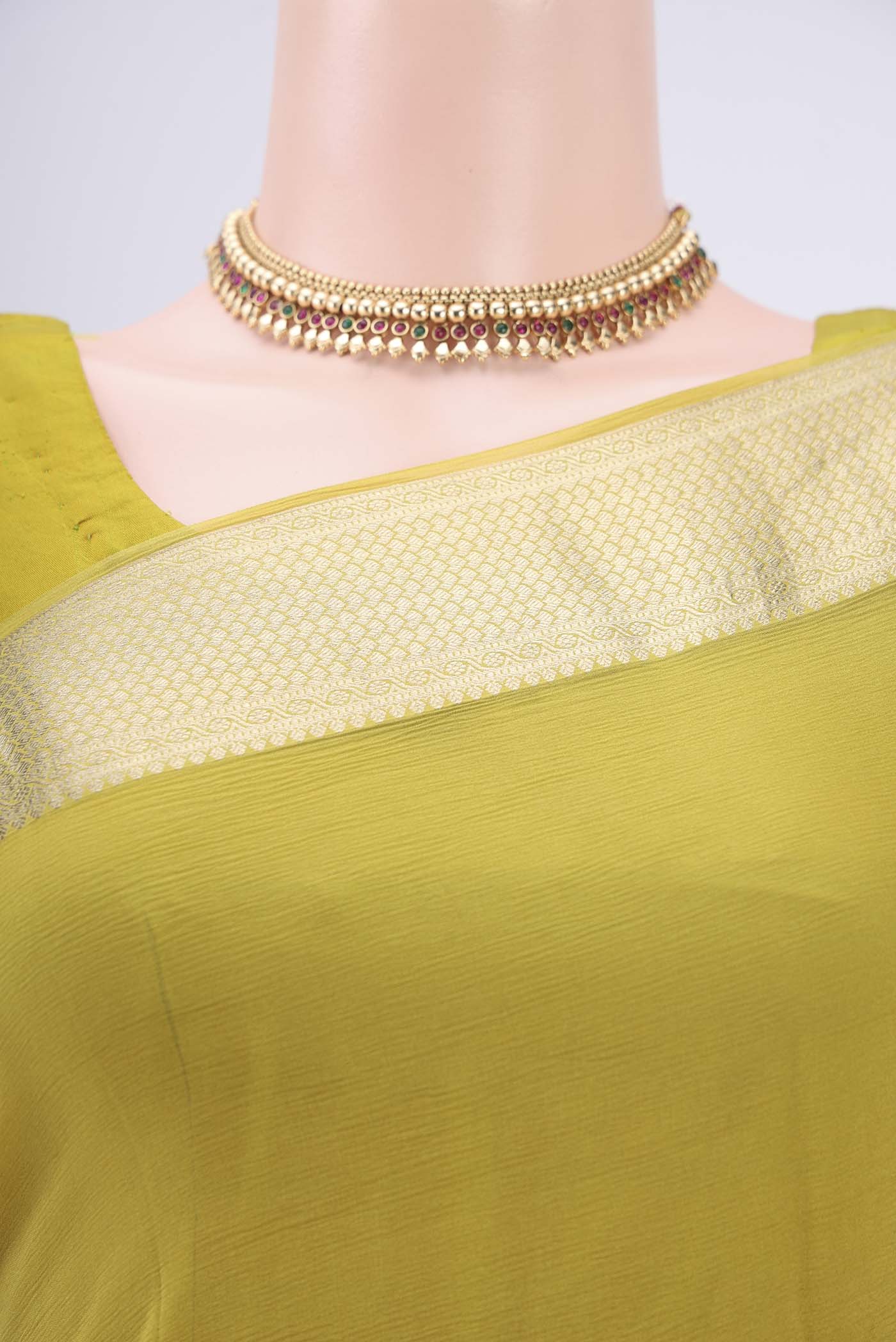 Border image of Mustard Mysore Chiffon Saree with Plain Body and Satin Border. 