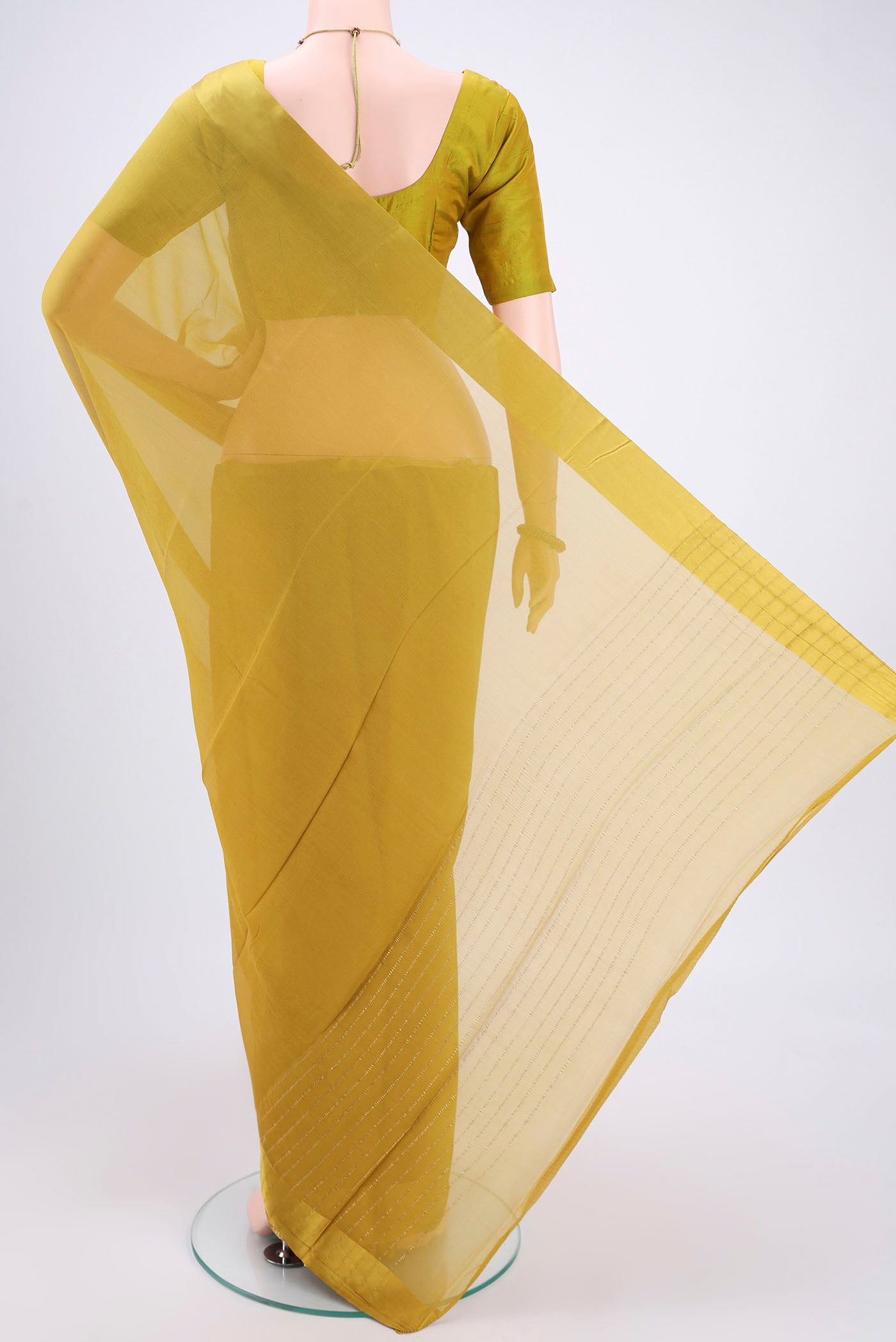 Flat view of Mehandi Green Mysore Chiffon Saree with Plain Body and Satin Border. 
