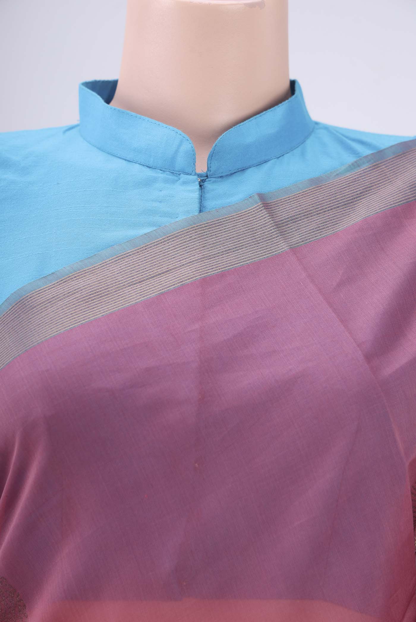 Border image of Rose Gold Kora Cotton Saree with Zari Butta on the body and Plain Border. 