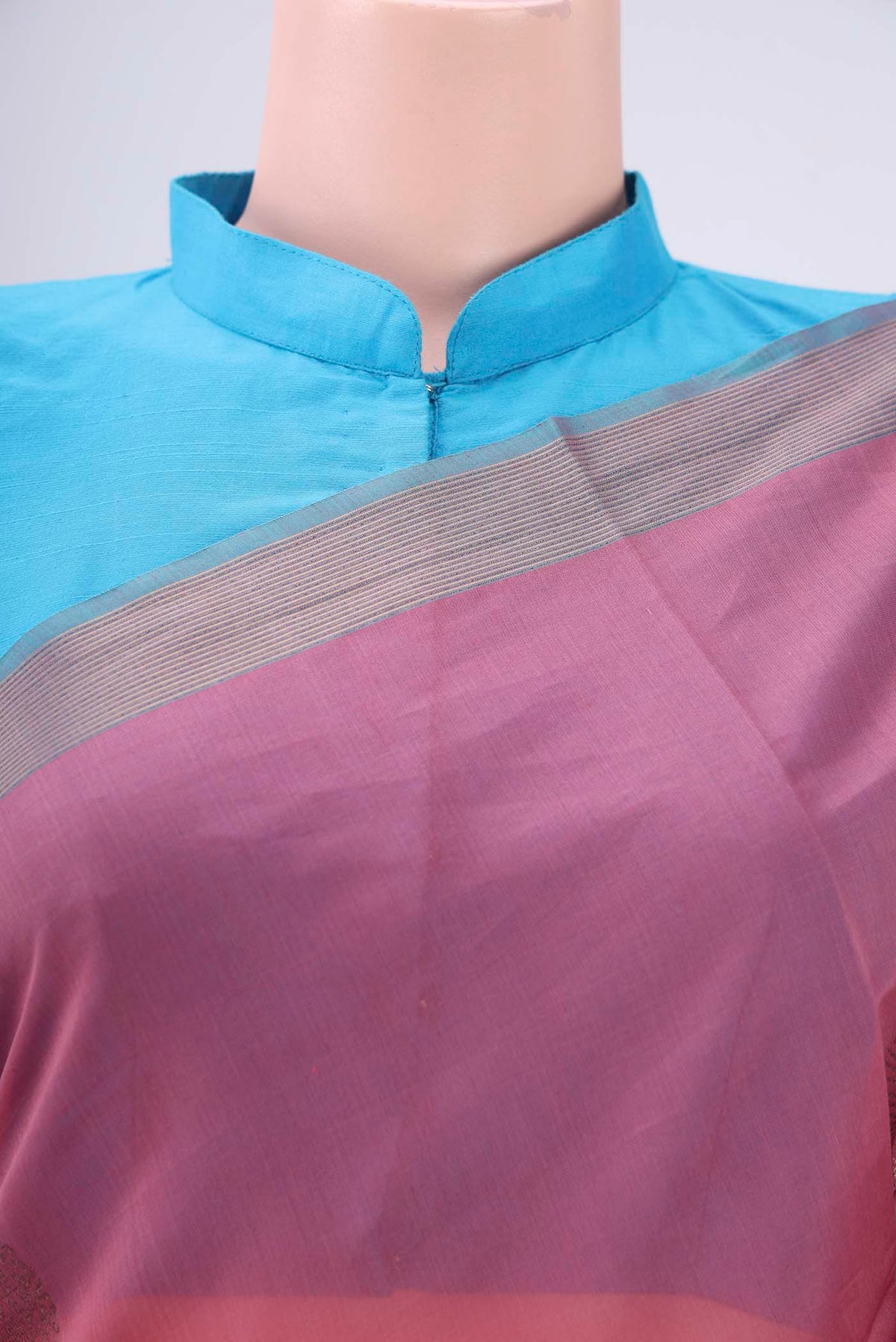 Border image of Rose Gold Kora Cotton Saree with Zari Butta on the body and Plain Border. 