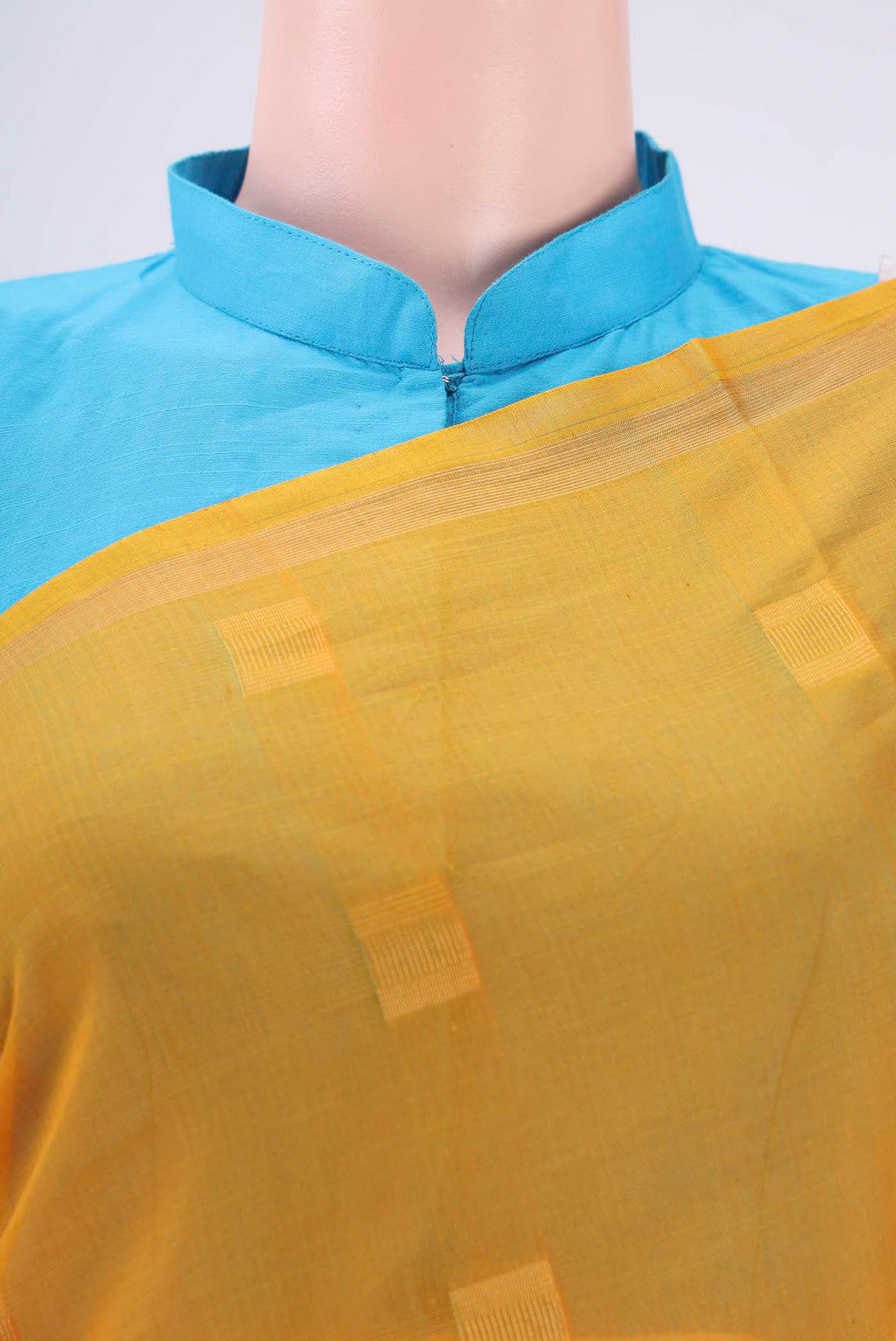 Border image of Yellow Silk Cotton Saree with Zari Butta on the body and Thin Zari Line. 