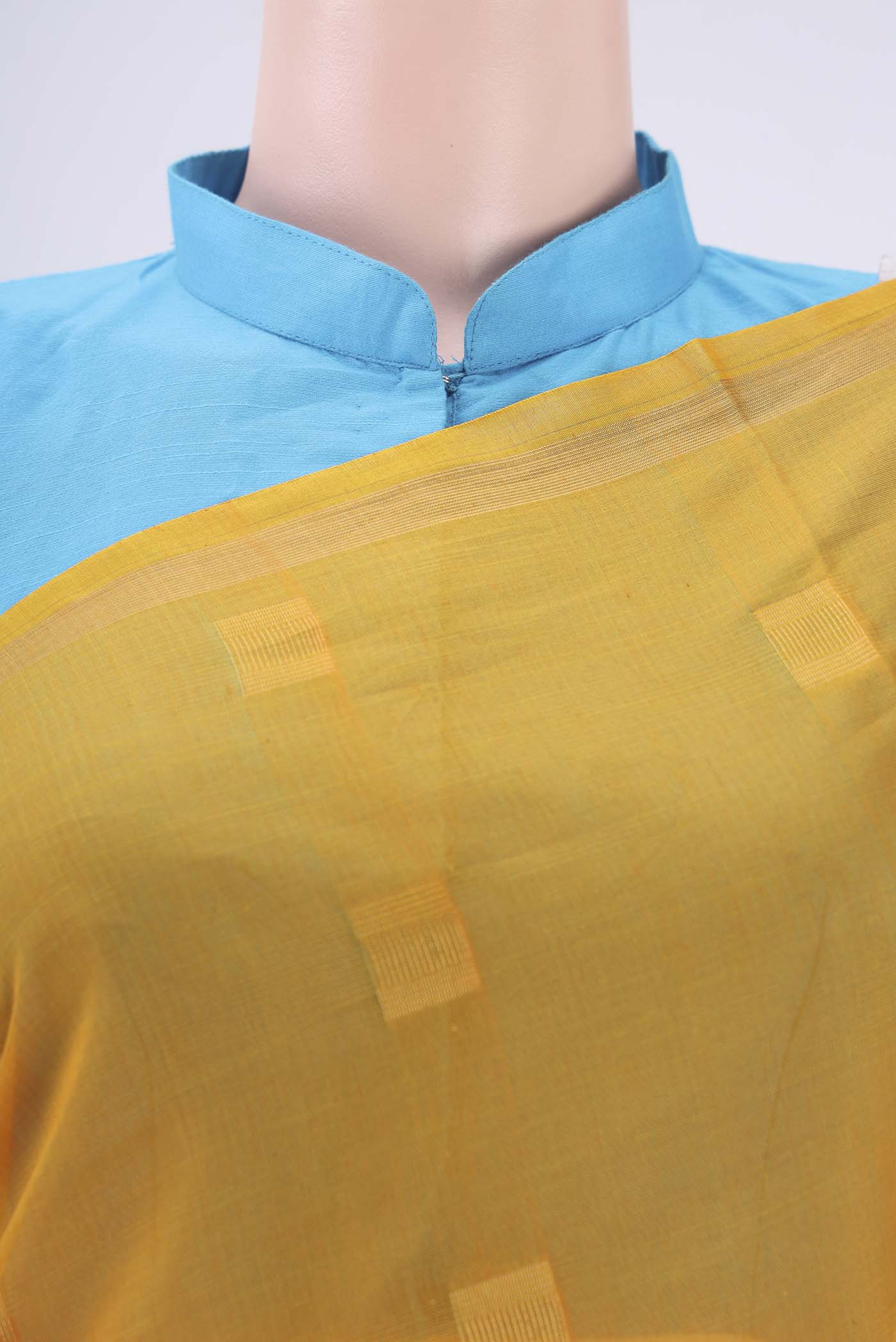 Border image of Yellow Silk Cotton Saree with Zari Butta on the body and Thin Zari Line. 