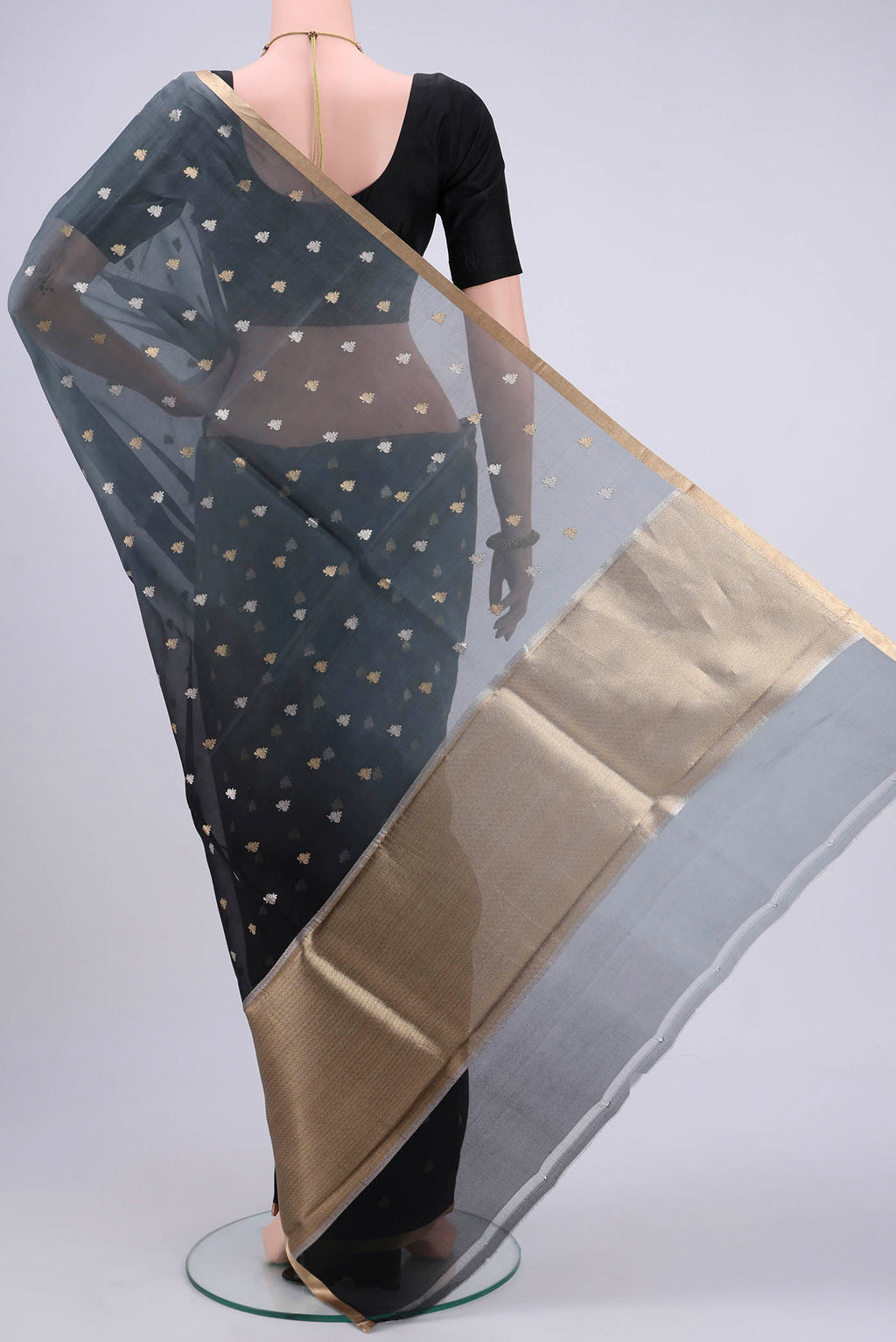 Flat view of Davys Grey Organza Silk Saree with Half And Half on the body and Zari Border. 