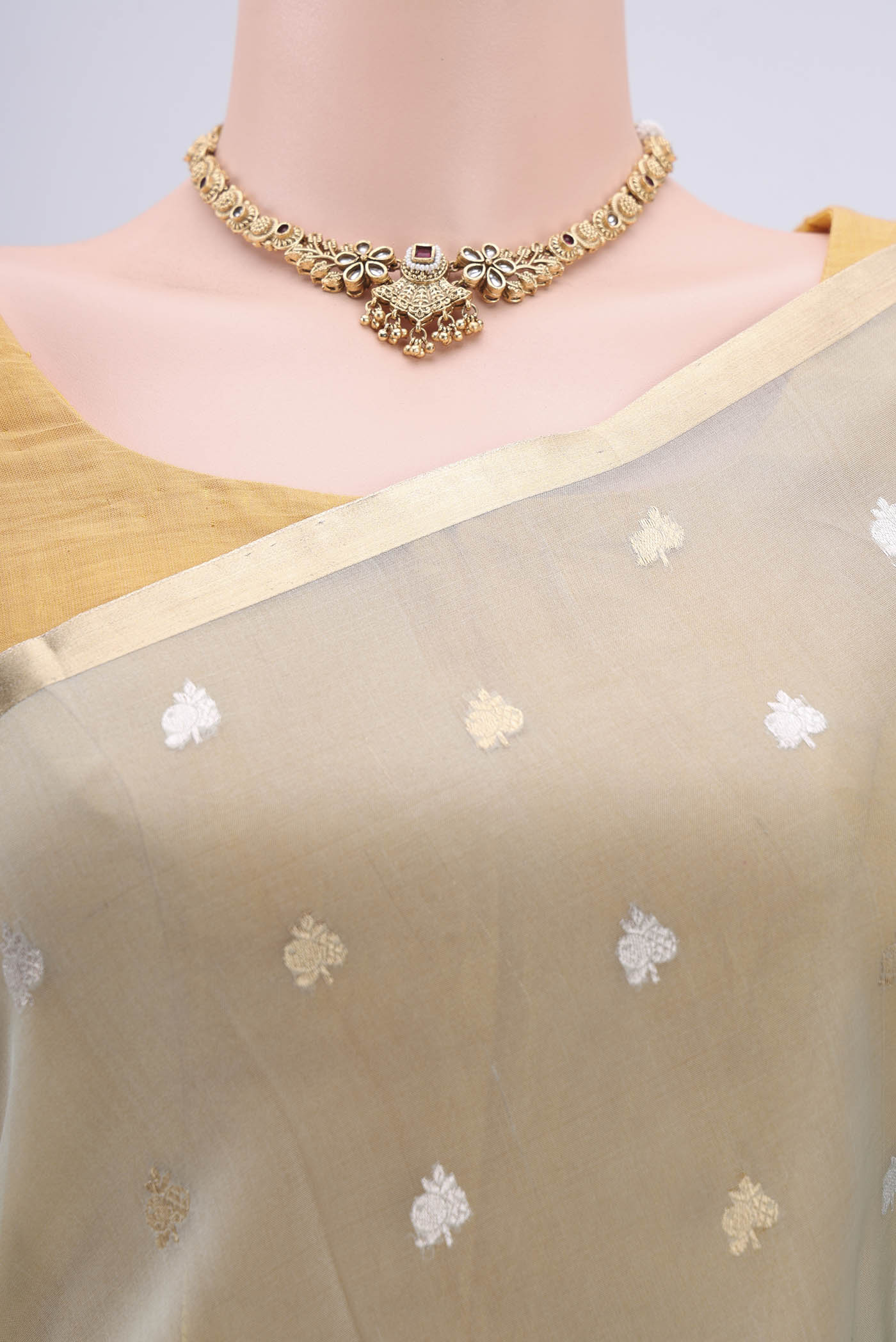 Border image of Sky Blue Organza Silk Saree with Zari Butta on the body and Zari Border. 