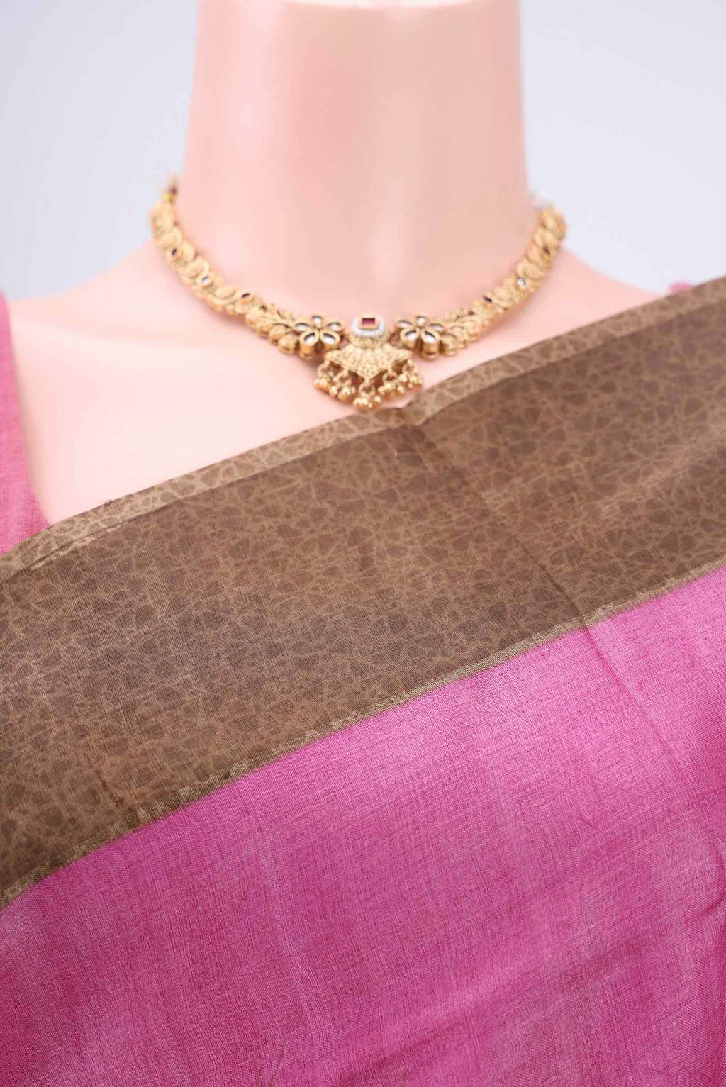 Border image of Pink Printed Silk Saree with Floral Print on the body and Zari Border. 