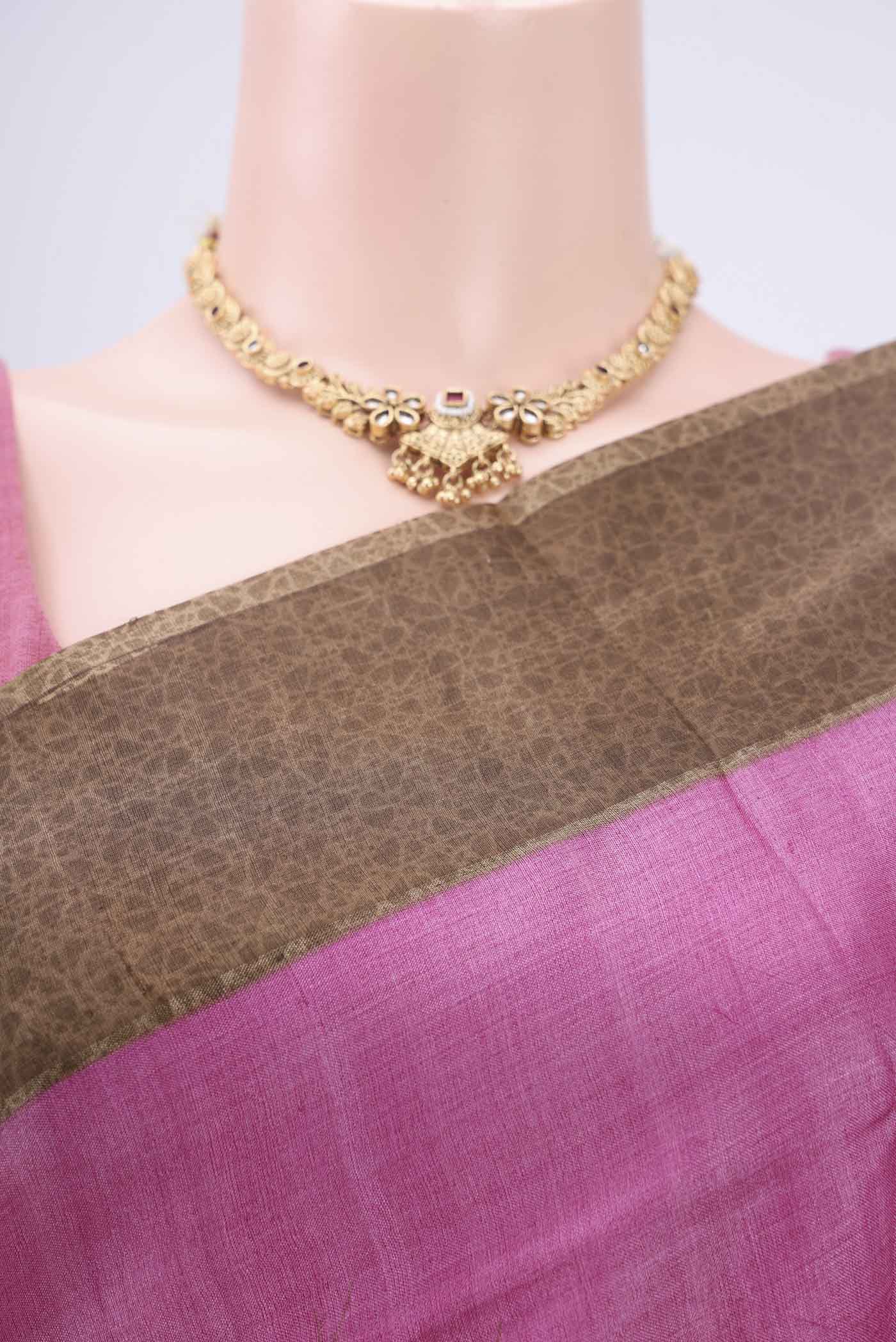 Border image of Pink Printed Silk Saree with Floral Print on the body and Zari Border. 