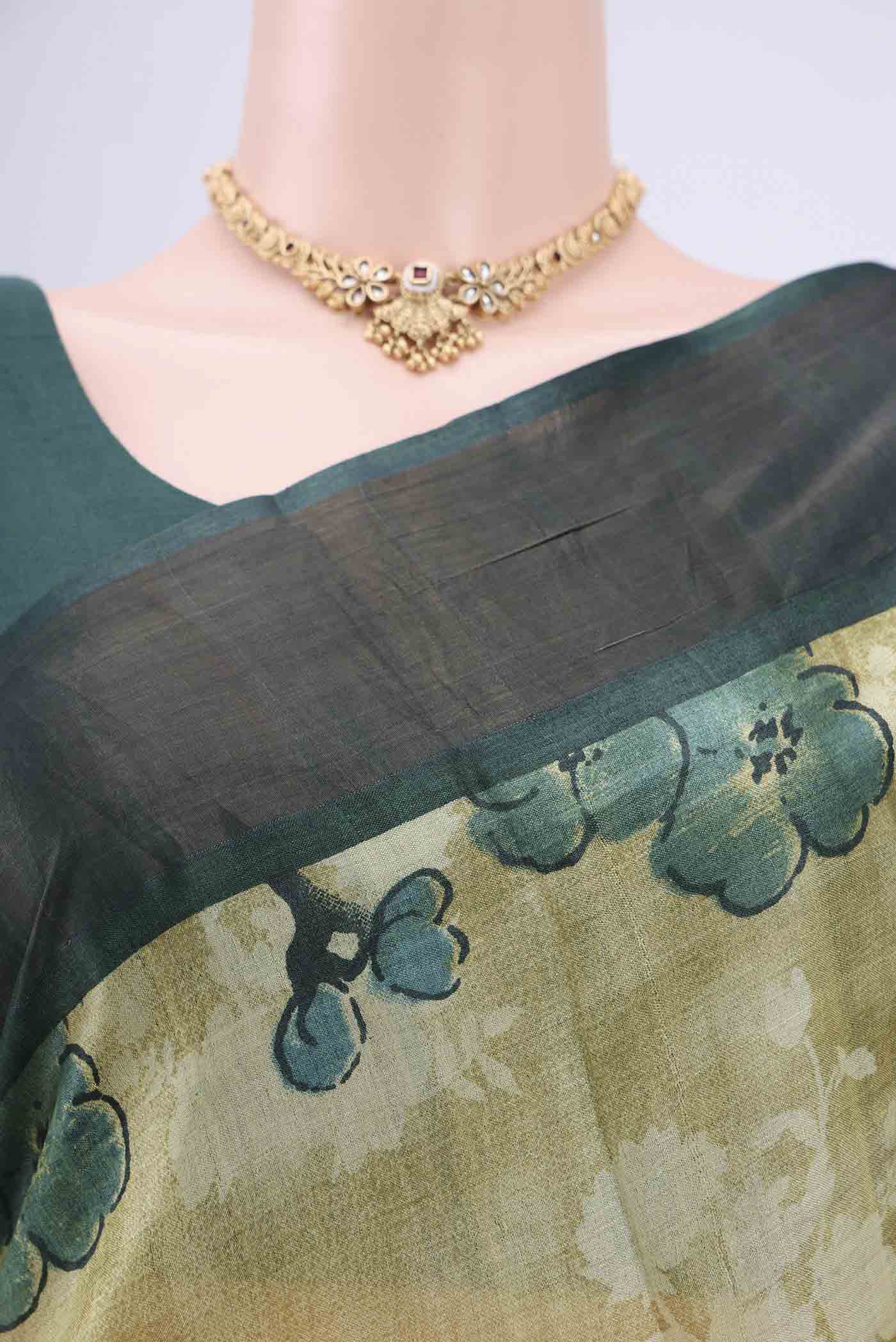Border image of Light Green Tussar Silk Saree with Printed design on the body and Zari Border. 