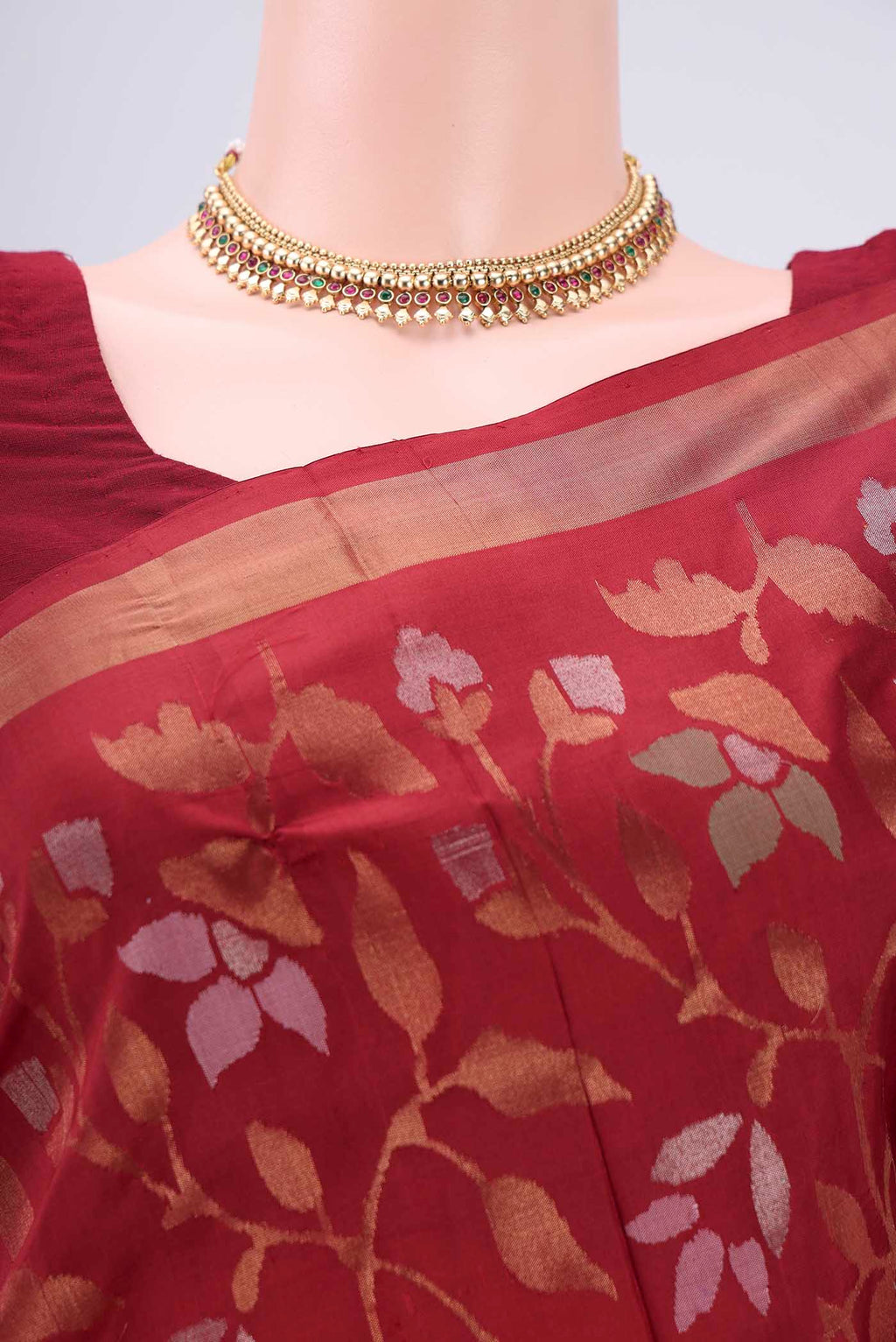 Border image of Maroon Uppada Silk Saree with Jamdani on the body and Zari Border. 