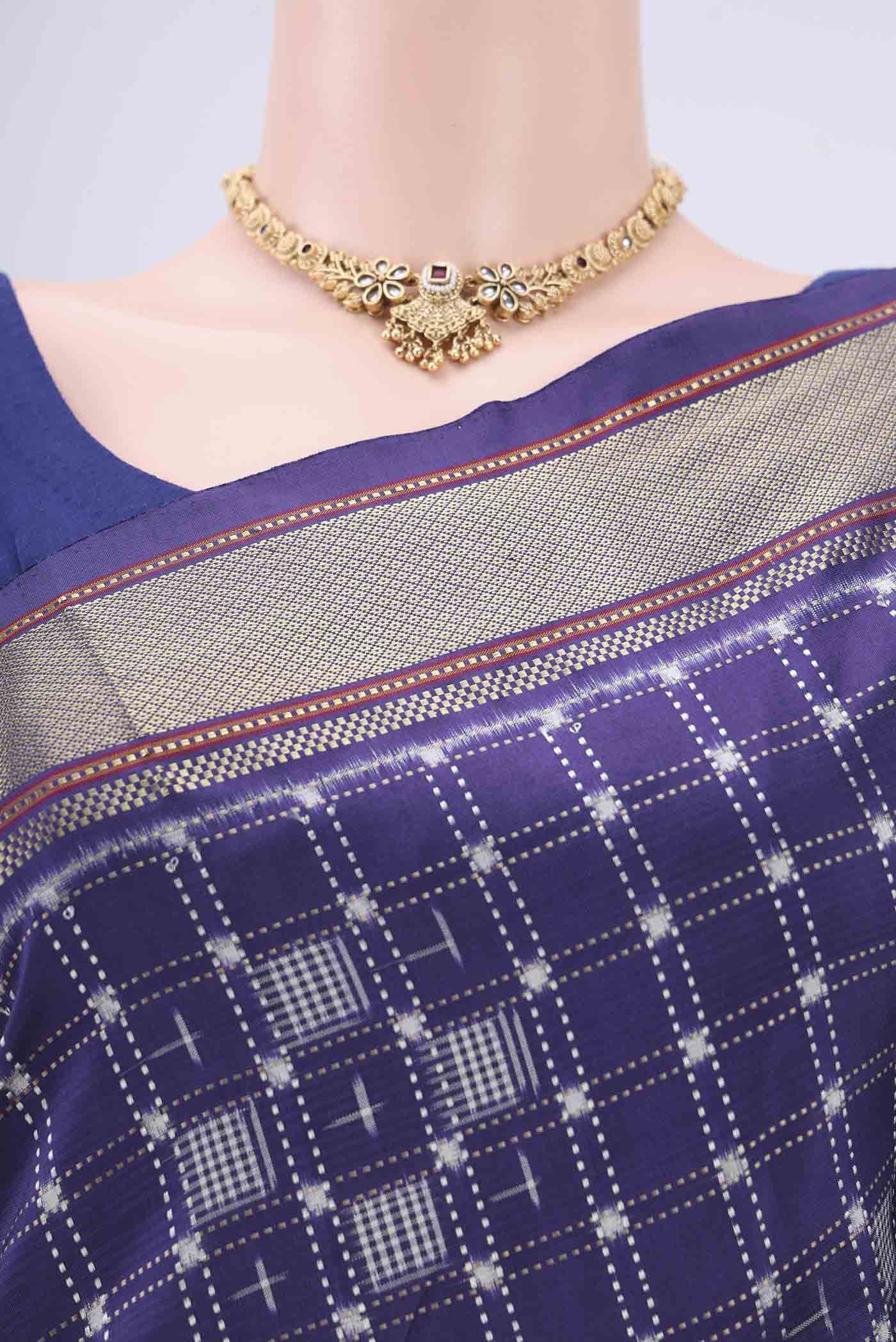 Border image of Purple Pochampally Silk Saree with Checked design on the body and Zari Border. 