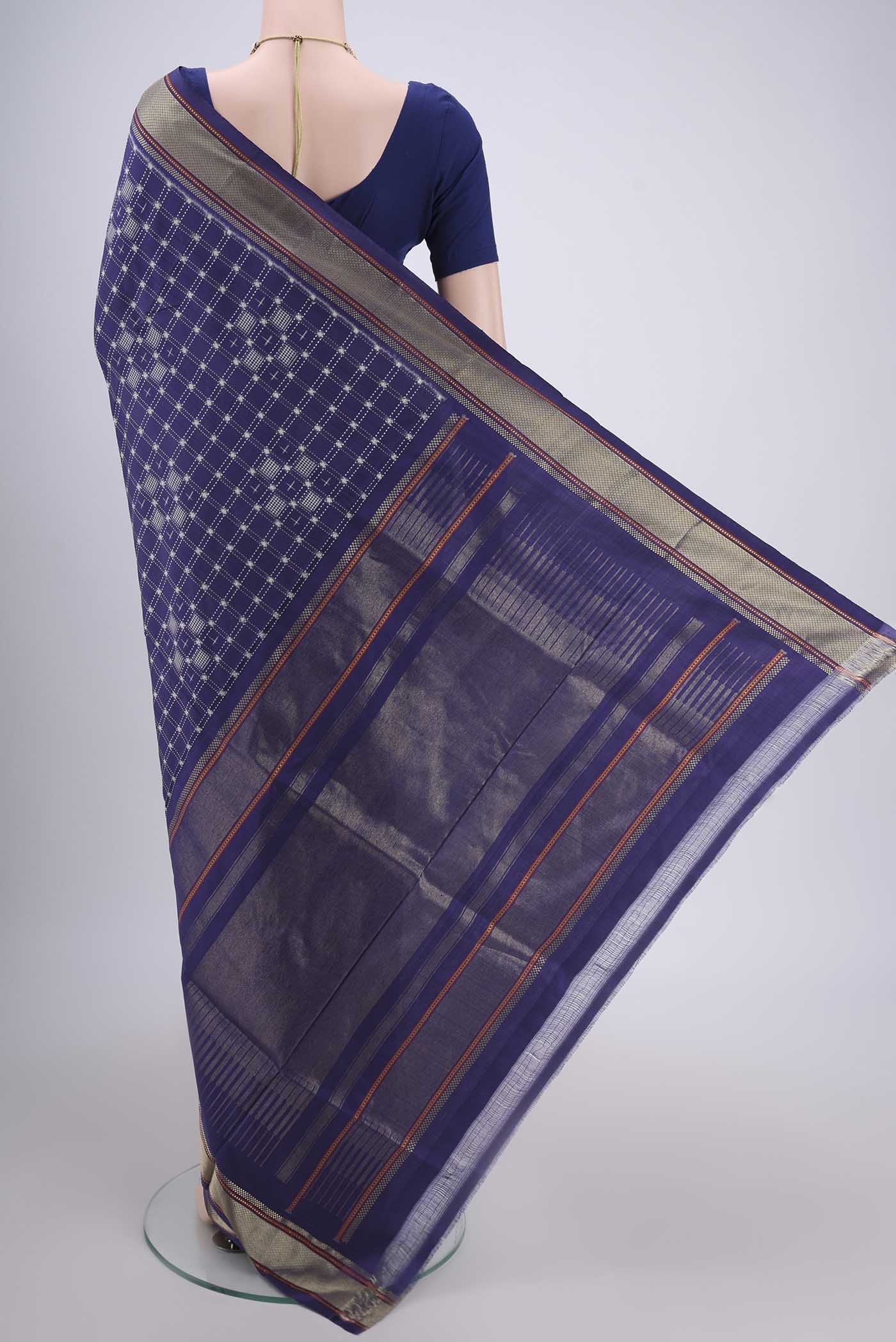 Flat view of Purple Pochampally Silk Saree with Checked design on the body and Zari Border. 