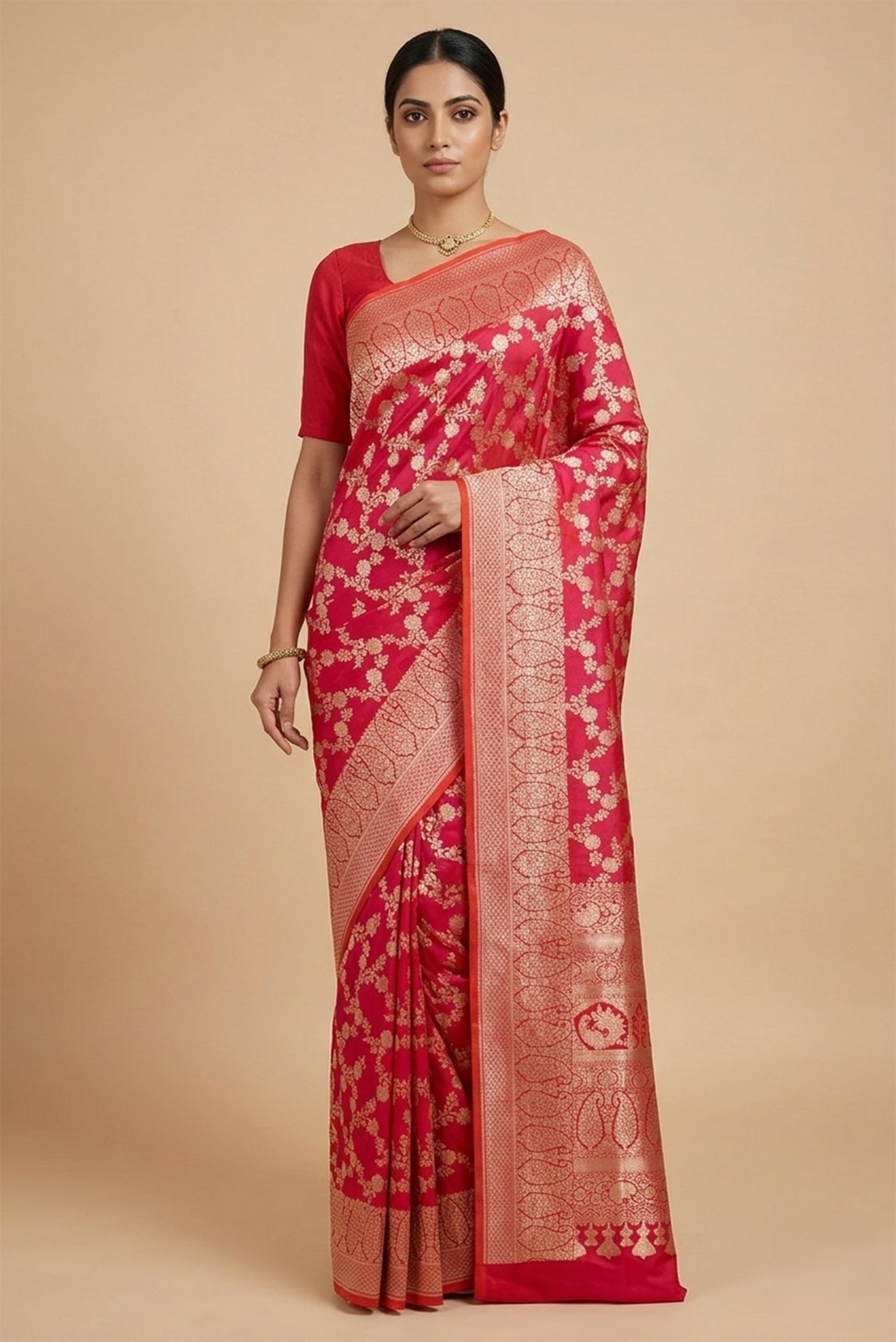 Model wearing a Pink with Orange Color Banarasi Silk Saree with Zari Brocade on the body and Zari Border.