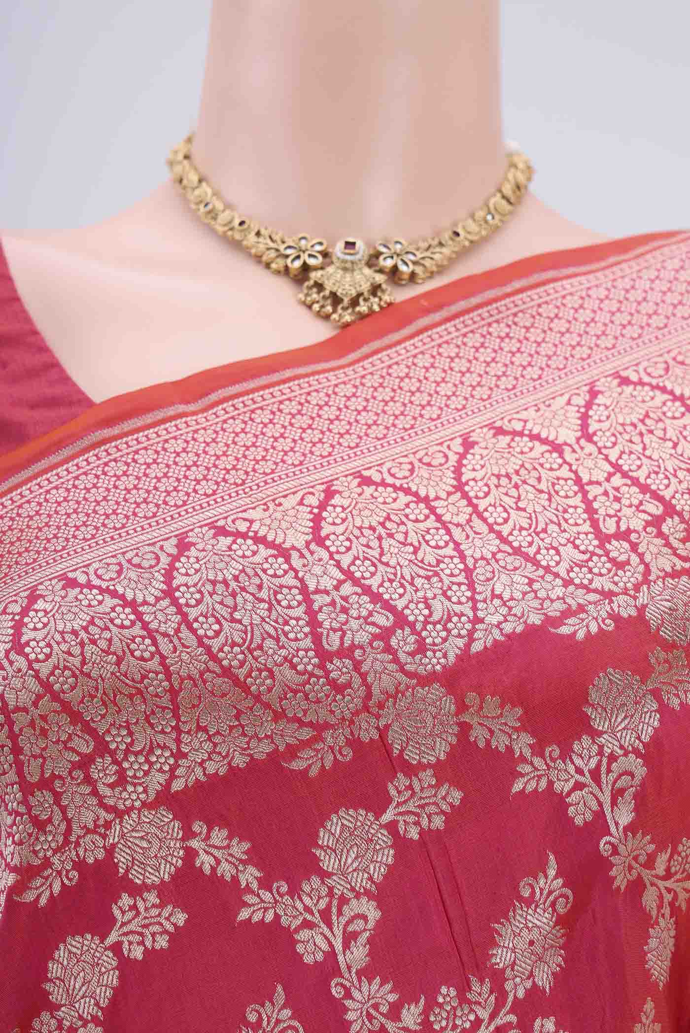 Border image of Pink Bangalore Silk Saree with Zari Butta on the body and Zari Border. 