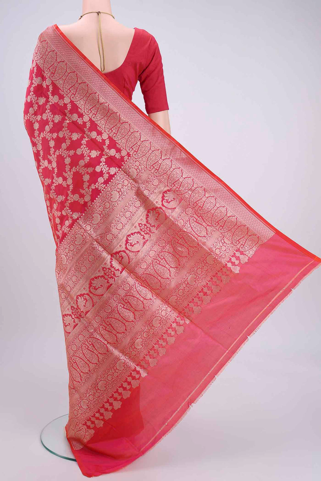 Flat view of Pink Bangalore Silk Saree with Zari Butta on the body and Zari Border. 