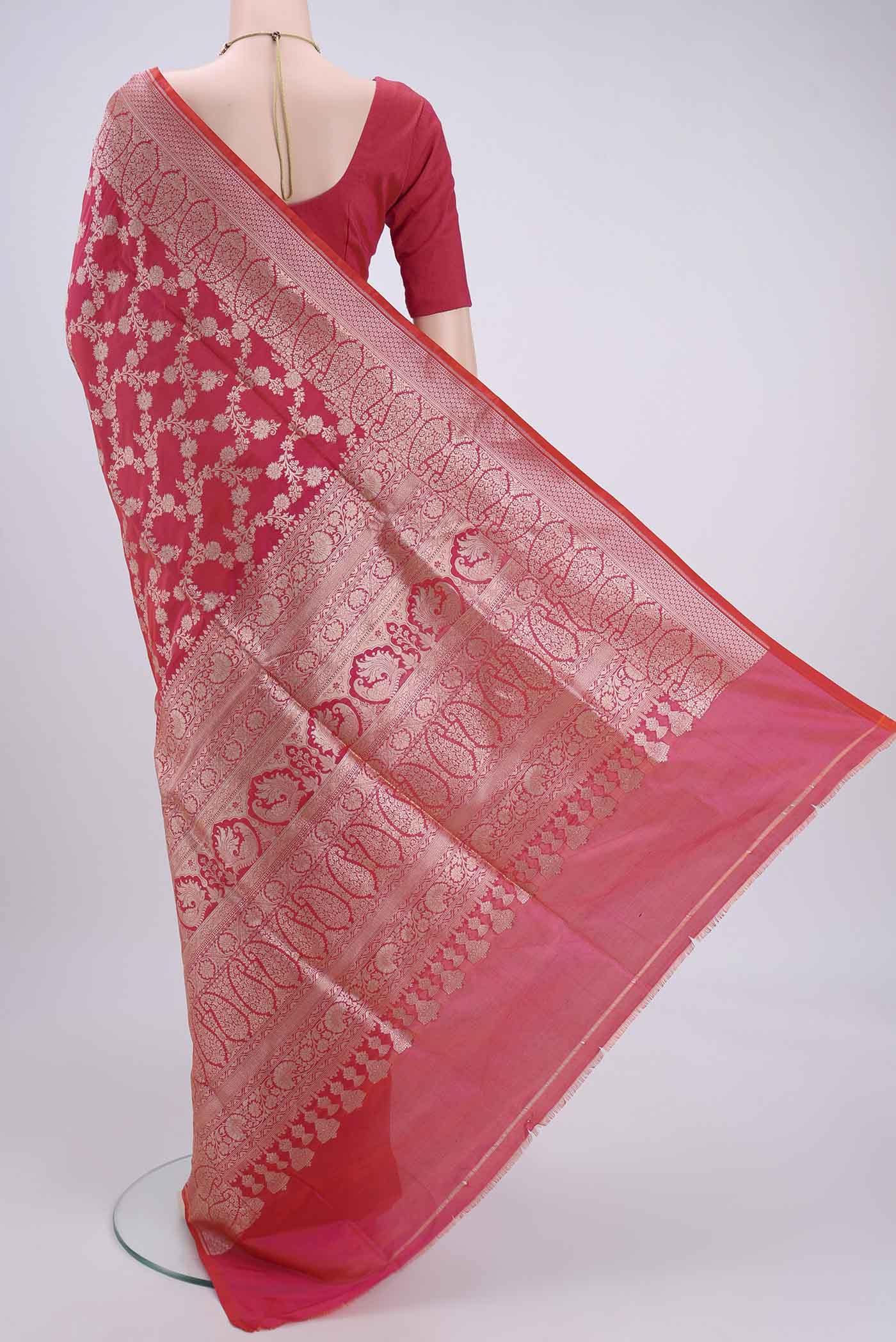 Flat view of Pink Bangalore Silk Saree with Zari Butta on the body and Zari Border. 