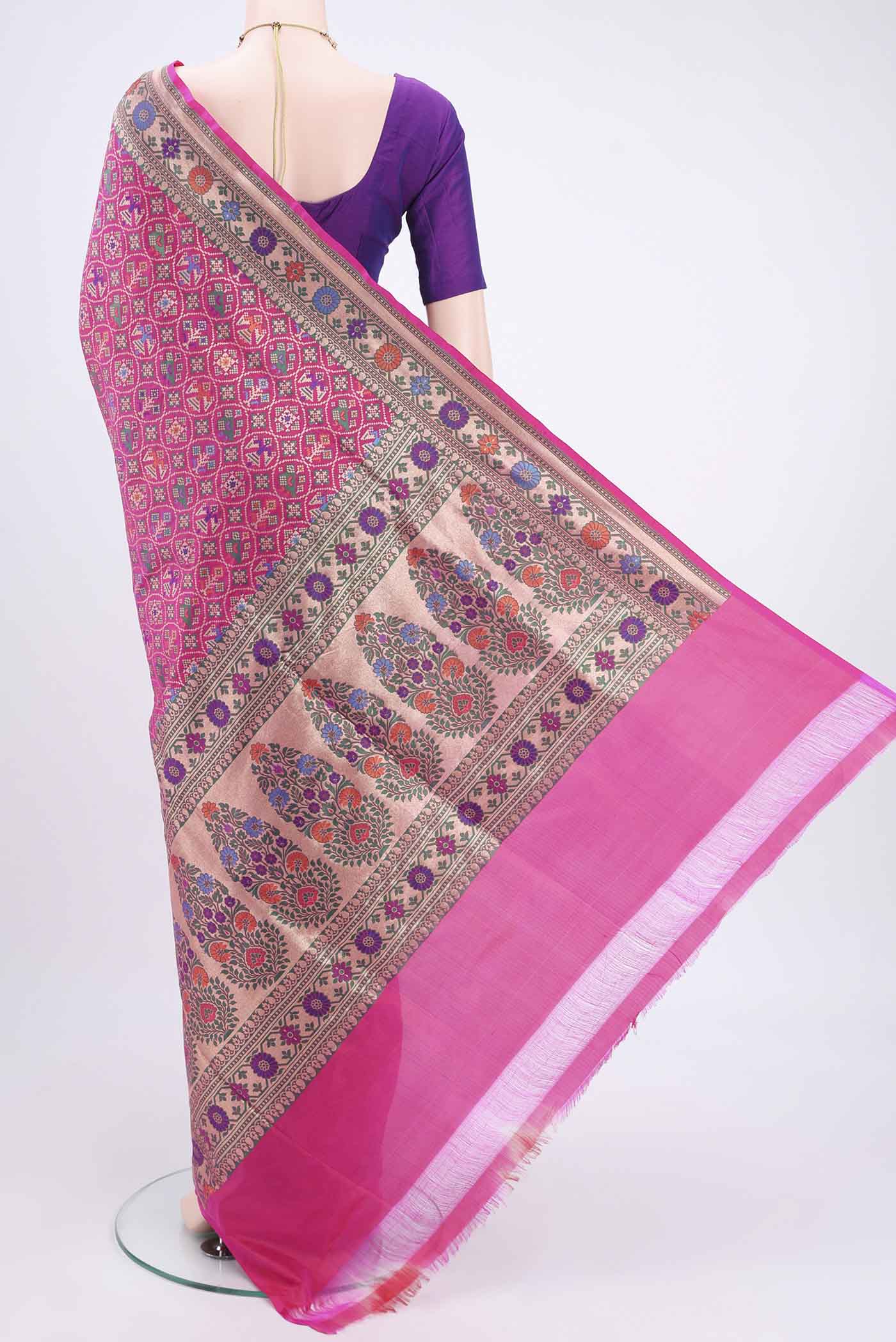Flat view of Rani Pink Banarasi Silk Saree with Jamdani on the body and Zari And Thread Border. 