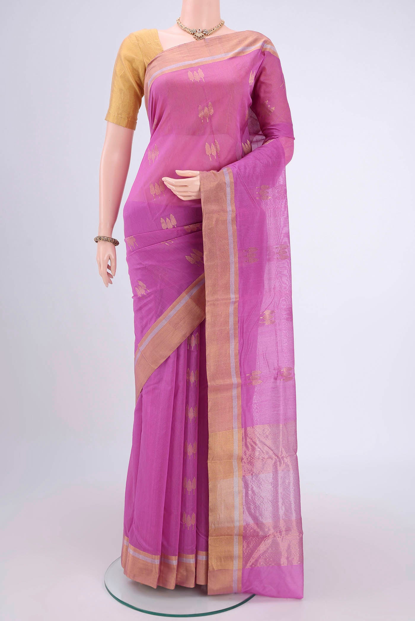 Lavender Chanderi Silk Cotton Saree with Zari Butta on the body and Zari Border.  displayed on a mannequin