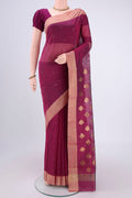 Magenta Chanderi Silk Cotton Saree with Zari Butta on the body and Zari Border.  displayed on a mannequin