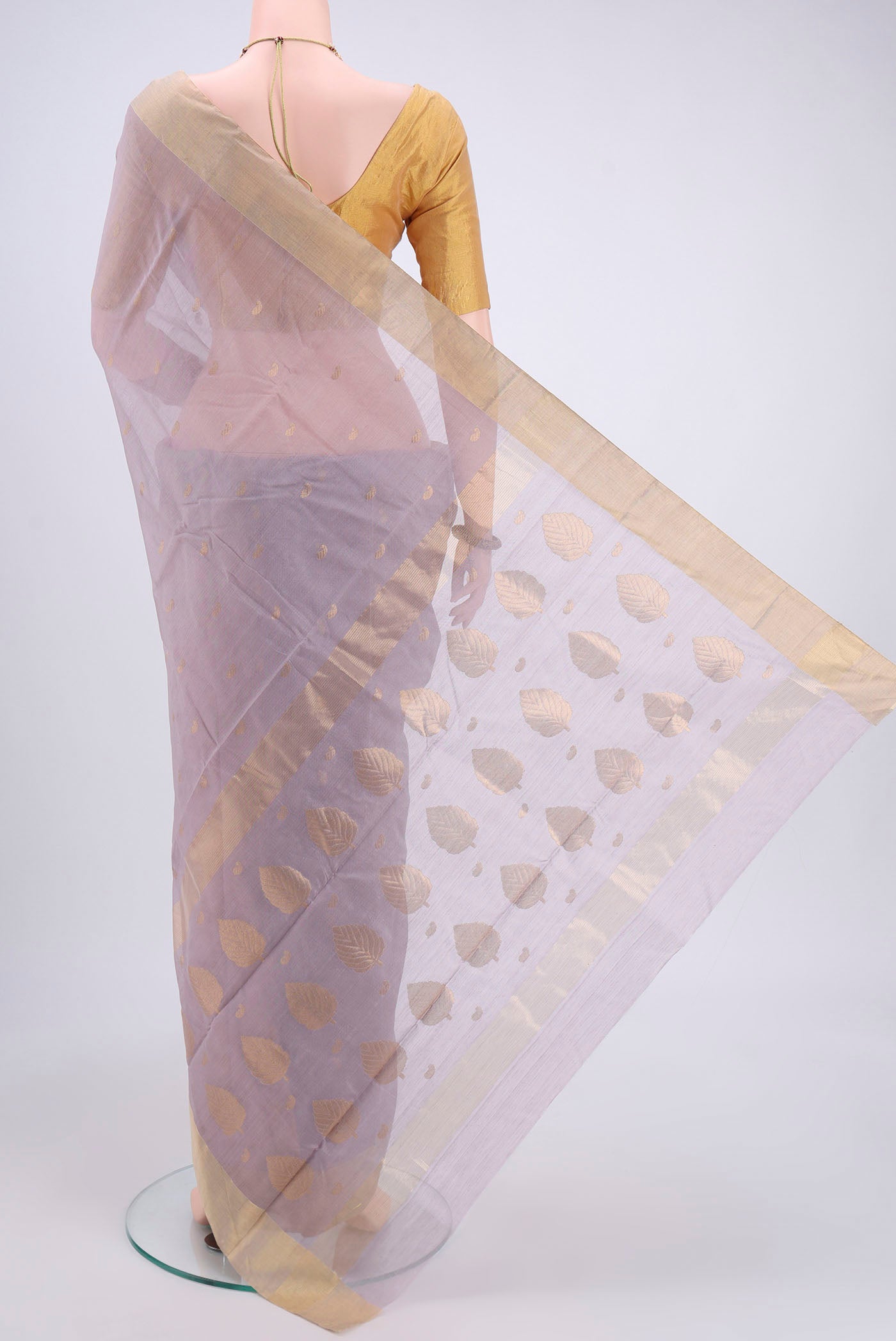 Flat view of Grey Chanderi Silk Cotton Saree with Zari Butta on the body and Zari Border. 