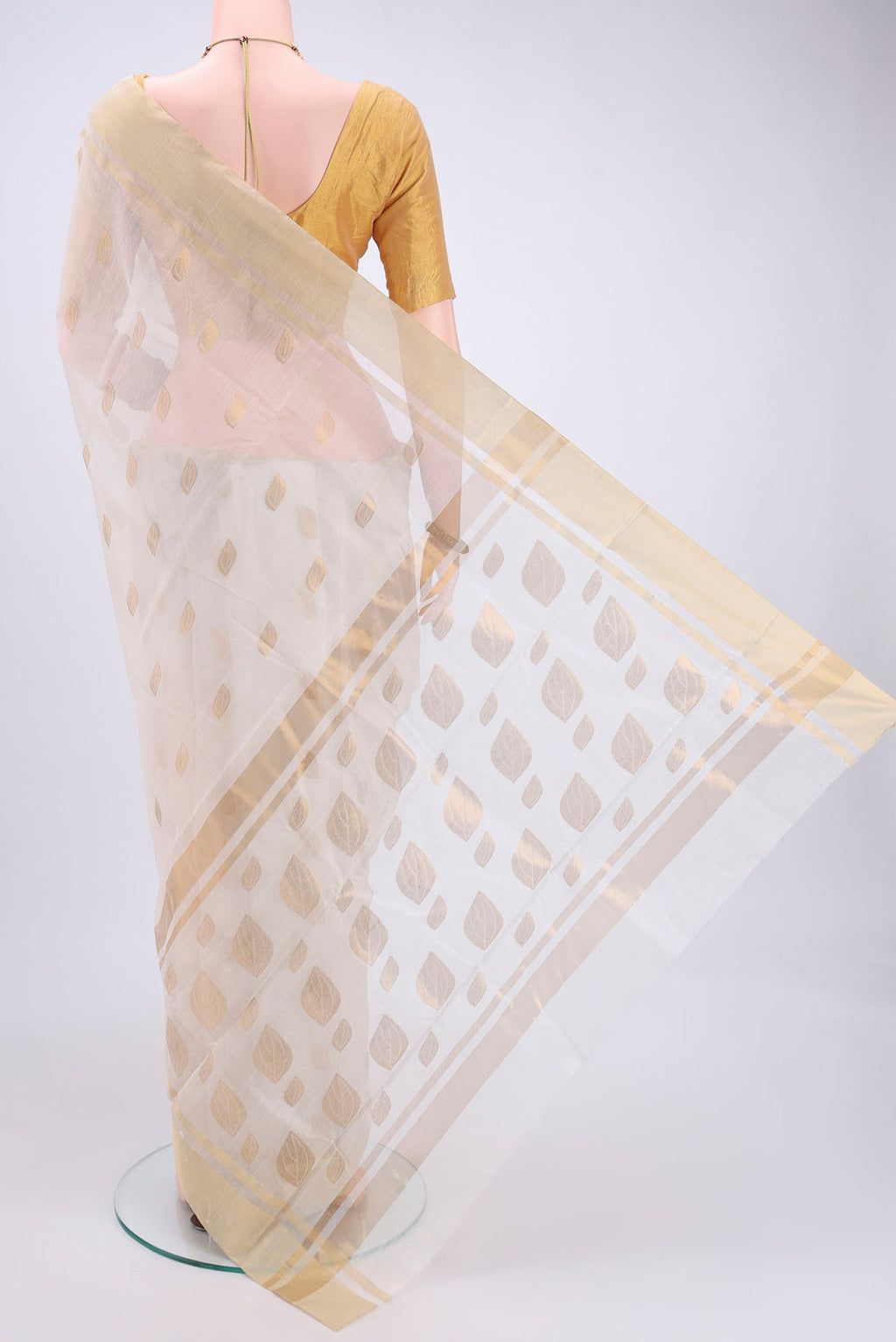Flat view of Pearl White Chanderi Silk Cotton Saree with Zari Butta on the body and Zari Border. 