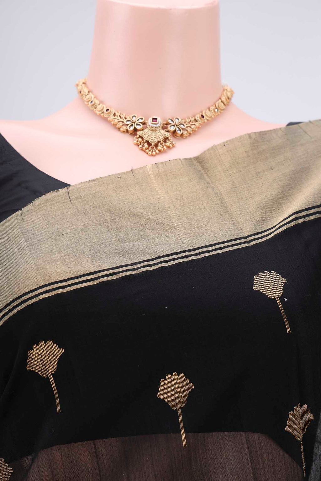 Border image of Black Chanderi Silk Cotton Saree with Zari Butta on the body and Zari Border. 