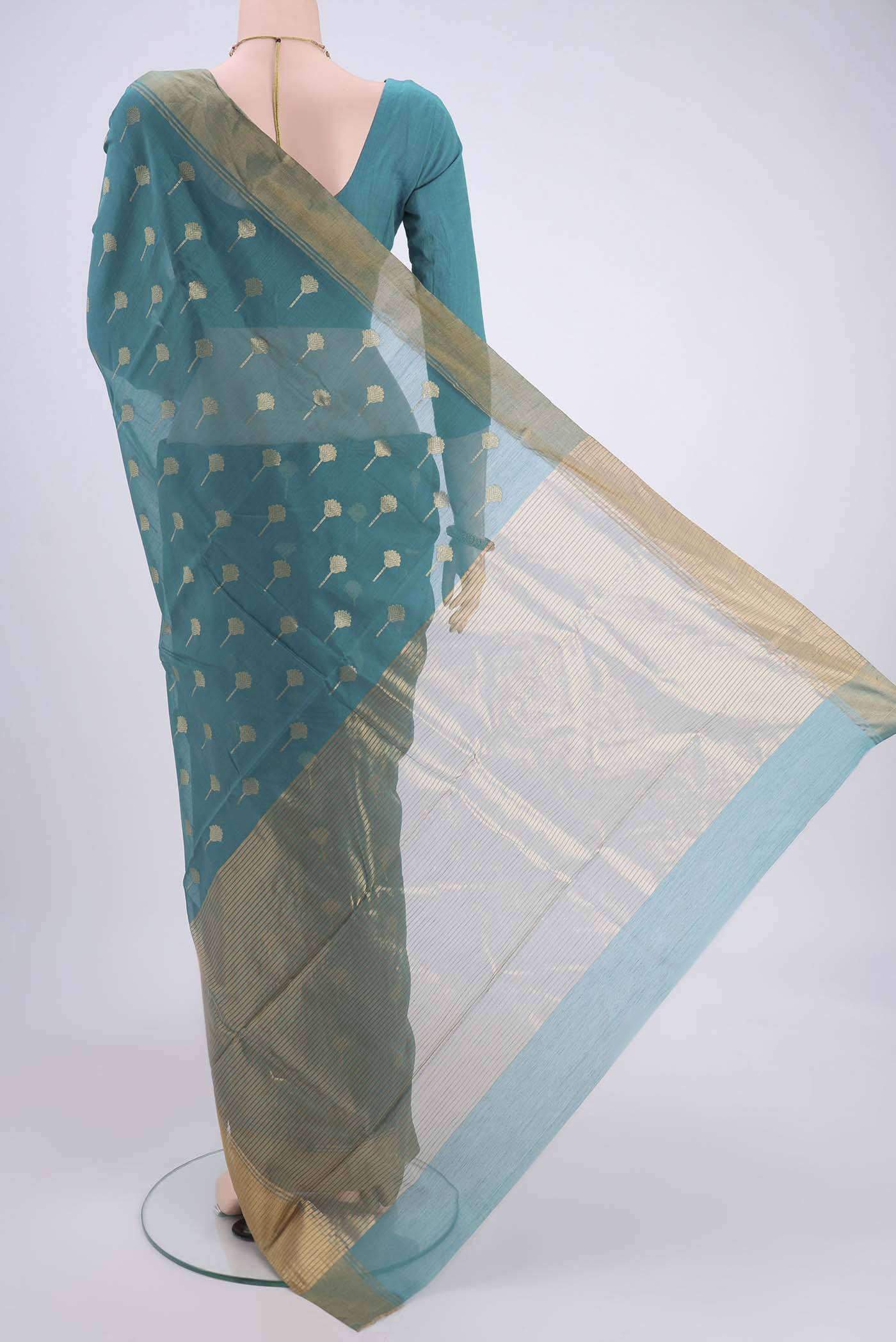 Flat view of Maya Blue Chanderi Silk Cotton Saree with Zari Butta on the body and Zari Border. 