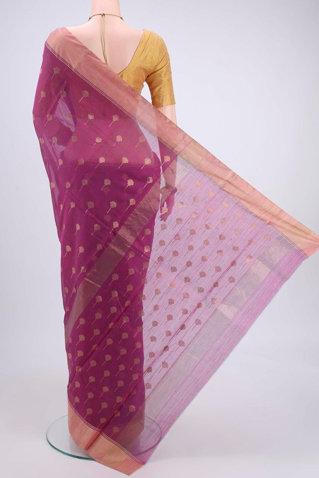 Flat view of Magenta Chanderi Silk Cotton Saree with Zari Butta on the body and Zari Border. 