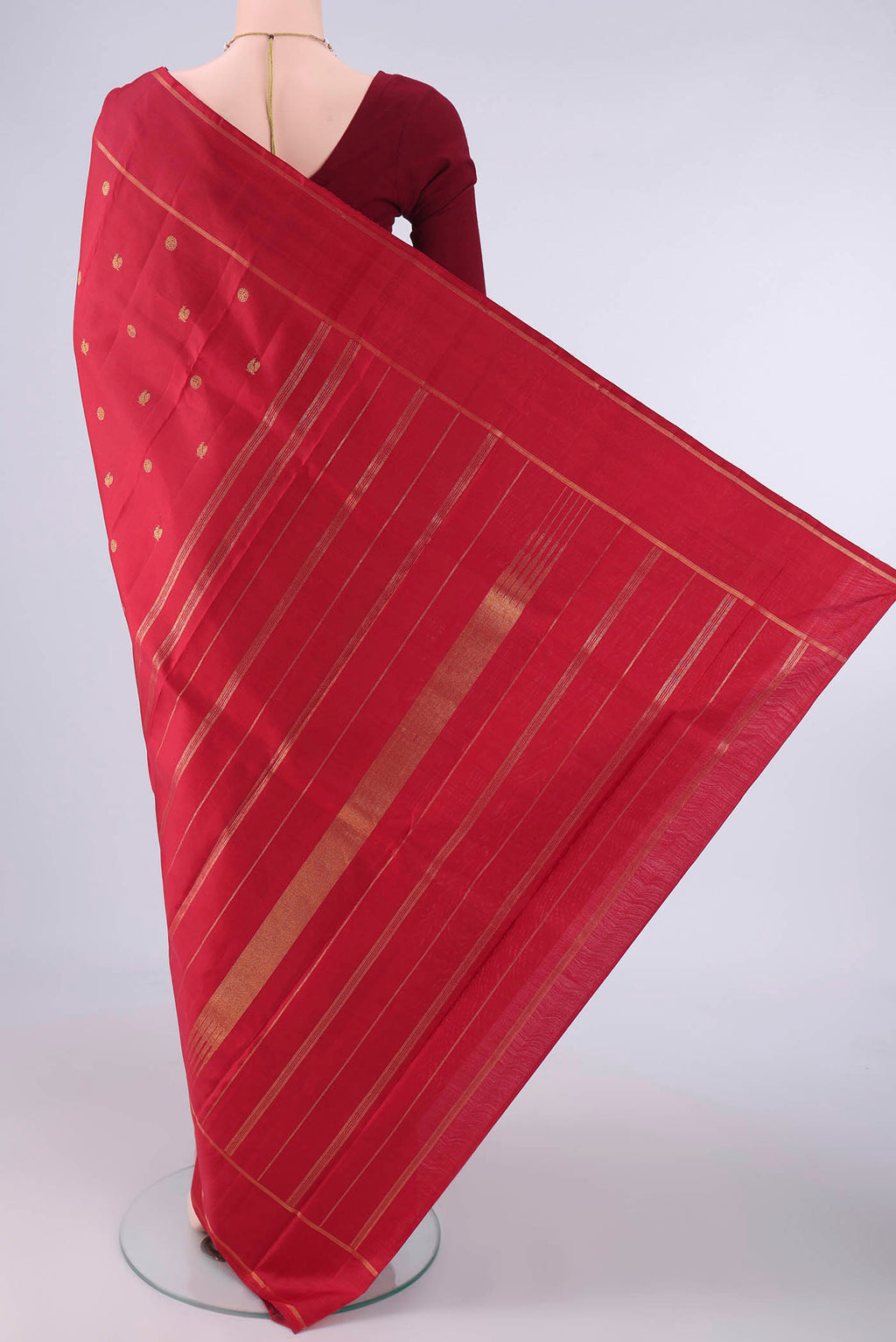 Flat view of Pure Silk Red Kanjivaram Saree with Zari Butta on the body and Zari Border. 