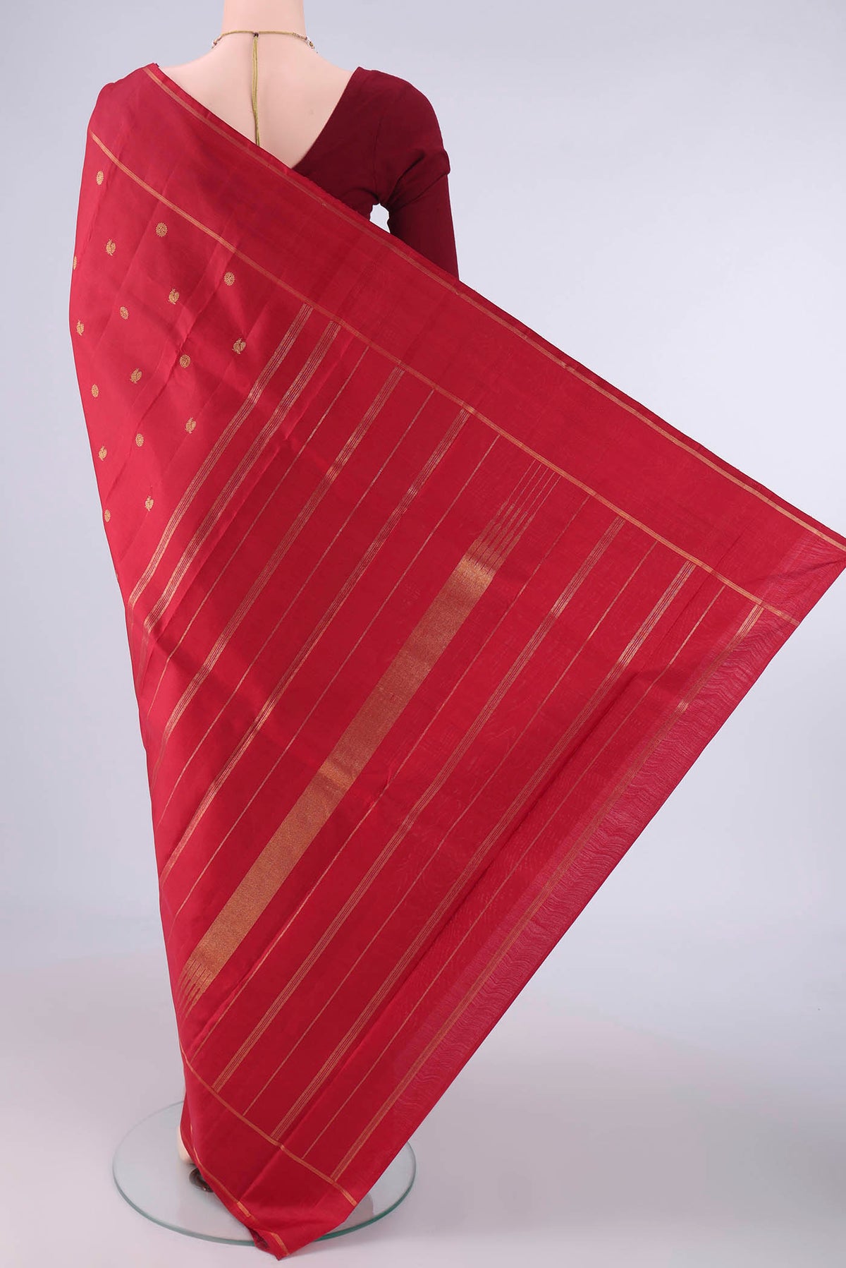 Flat view of Pure Silk Red Kanjivaram Saree with Zari Butta on the body and Zari Border. 