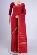 Maroon Kanjivaram Silk Saree with Checked design on the body and Zari Border.  displayed on a mannequin