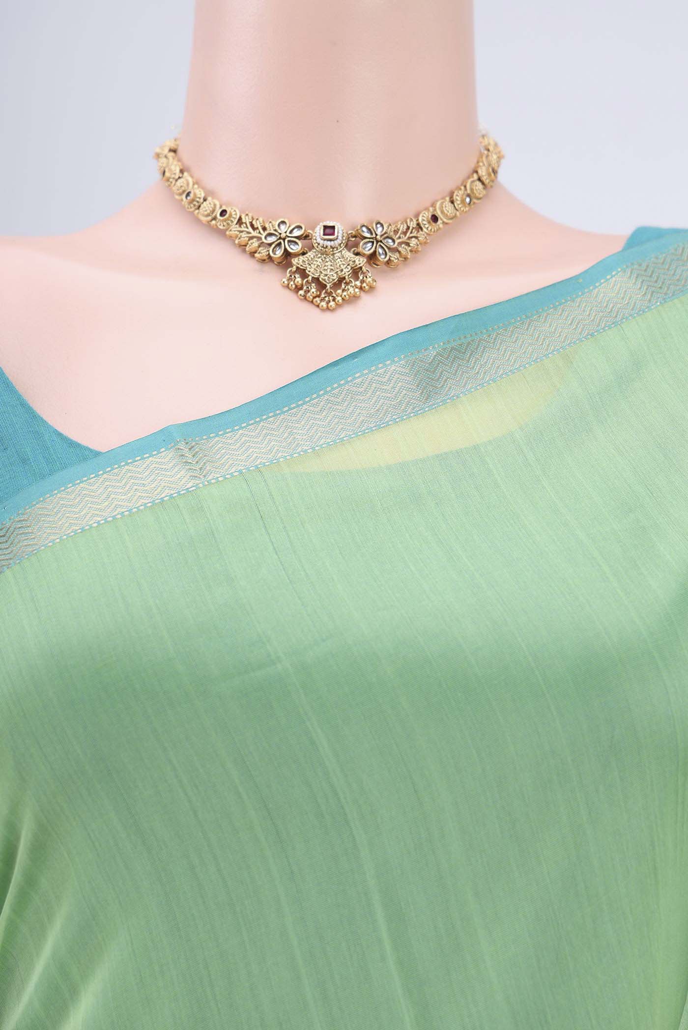 Border image of Acid Green Maheshwari Silk Cotton Saree with Plain Body and Zari Border. 