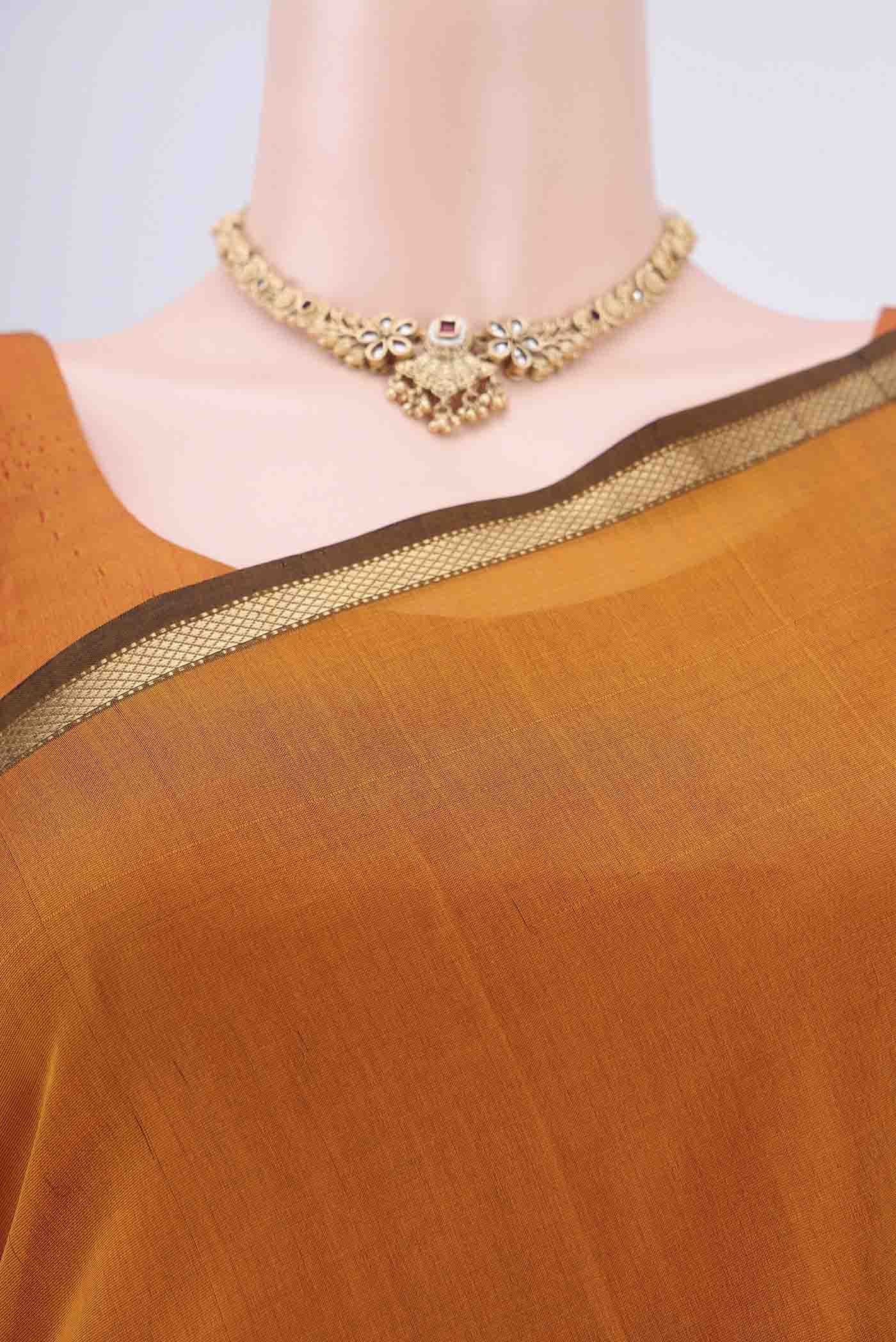 Border image of Mustard Maheshwari Silk Cotton Saree with Plain Body and Zari Border. 