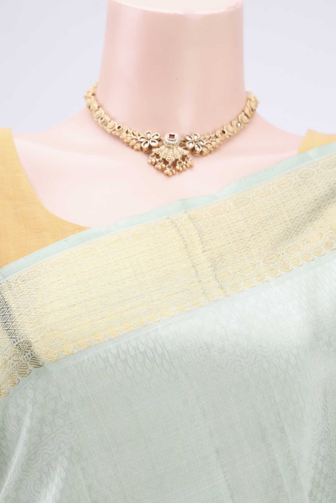 Border image of Mint Green Kanjivaram Silk Saree with Jacquard With Zari Butta on the body and Zari Border. 