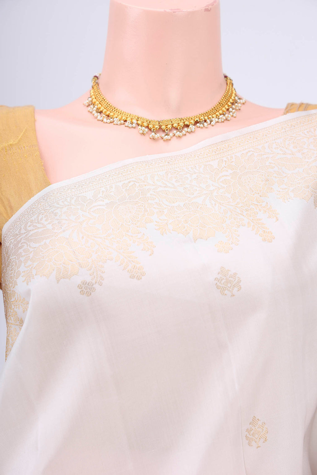 Border image of White Dual Tone Kanjivaram Silk Saree with Zari Butta on the body and Zari Border. 