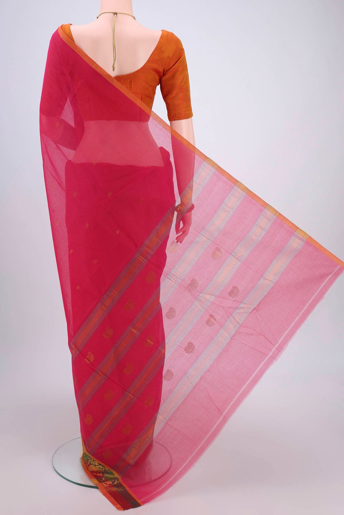 Flat view of Red Venkatagiri Cotton Saree with Zari Butta on the body and Zari Border. 