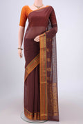 Brown Venkatagiri Cotton Saree with Zari Butta on the body and Zari Border.  displayed on a mannequin