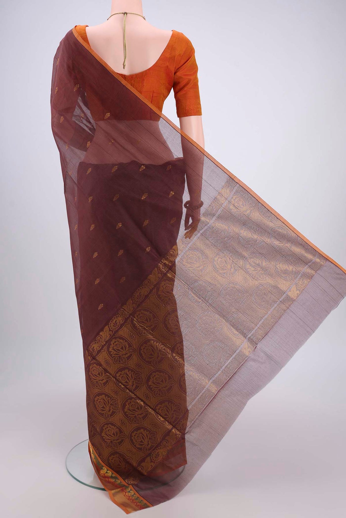 Flat view of Brown Venkatagiri Cotton Saree with Zari Butta on the body and Zari Border. 