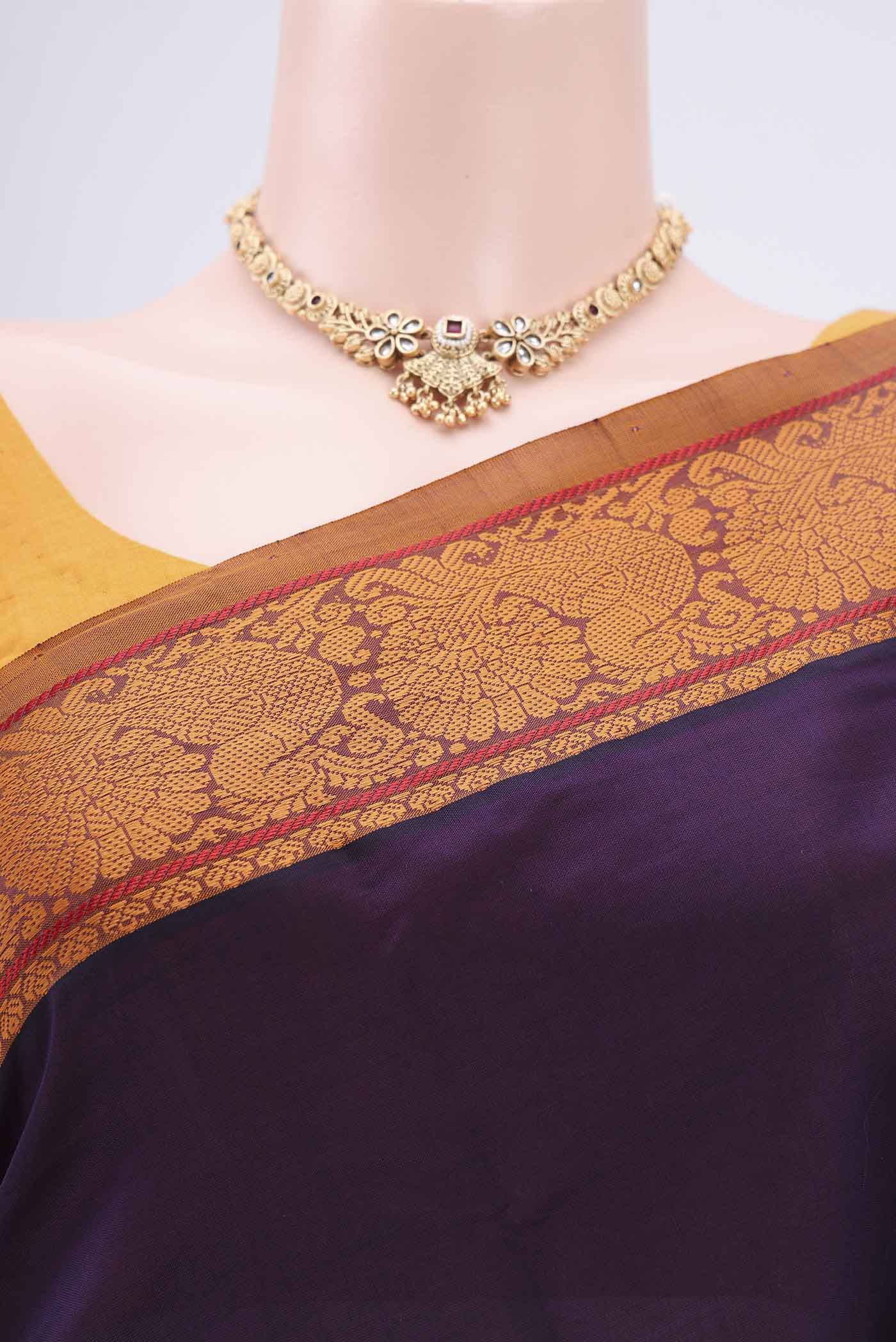 Border image of Burgundy Blended Poly Cotton Saree with Plain Body and Thread Border. 