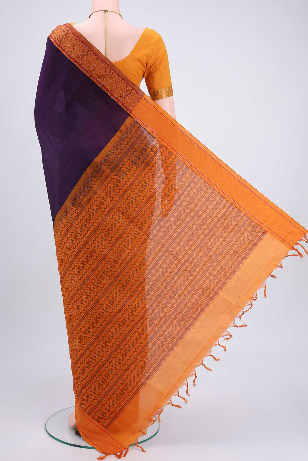 Flat view of Burgundy Blended Poly Cotton Saree with Plain Body and Thread Border. 