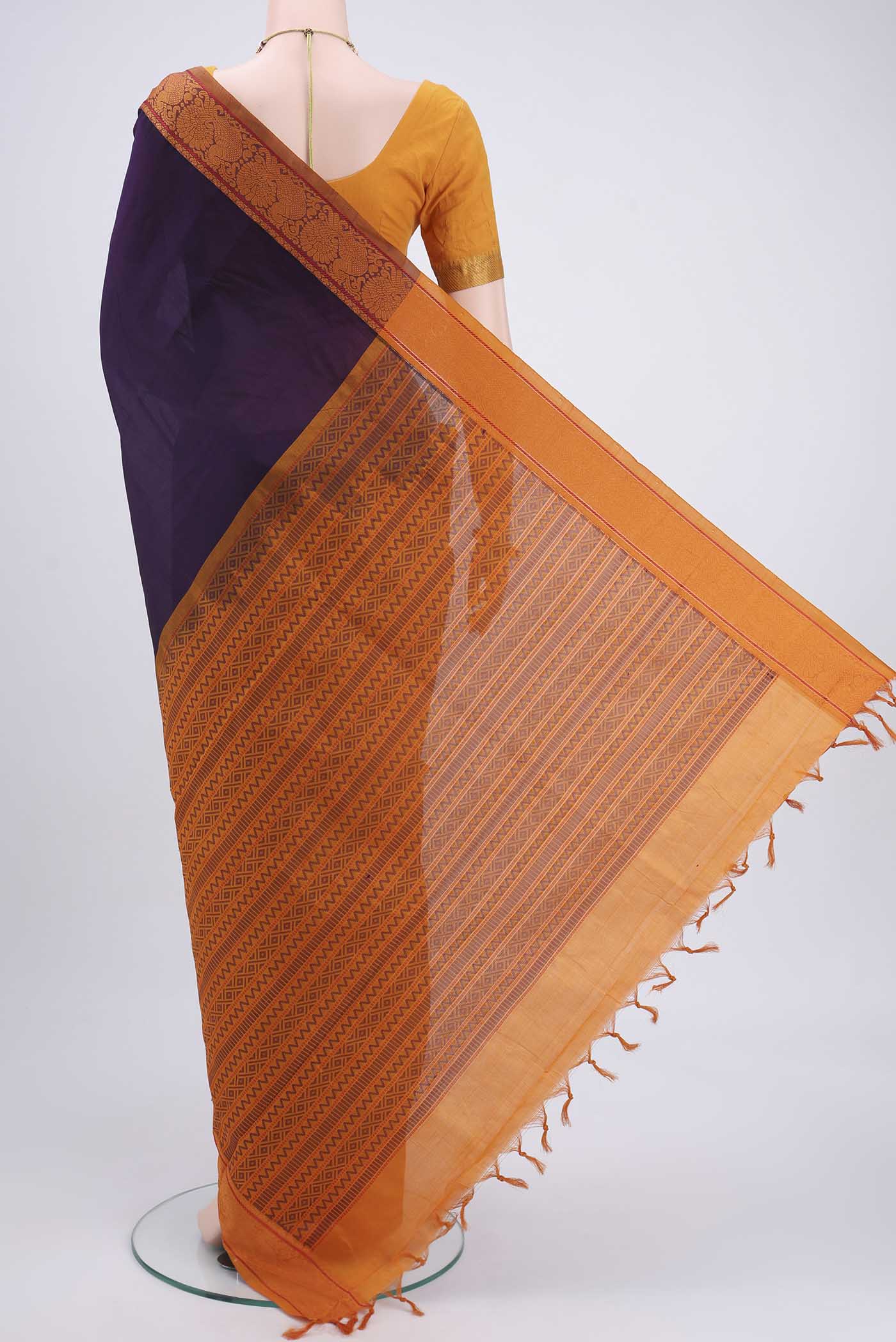 Flat view of Burgundy Blended Poly Cotton Saree with Plain Body and Thread Border. 