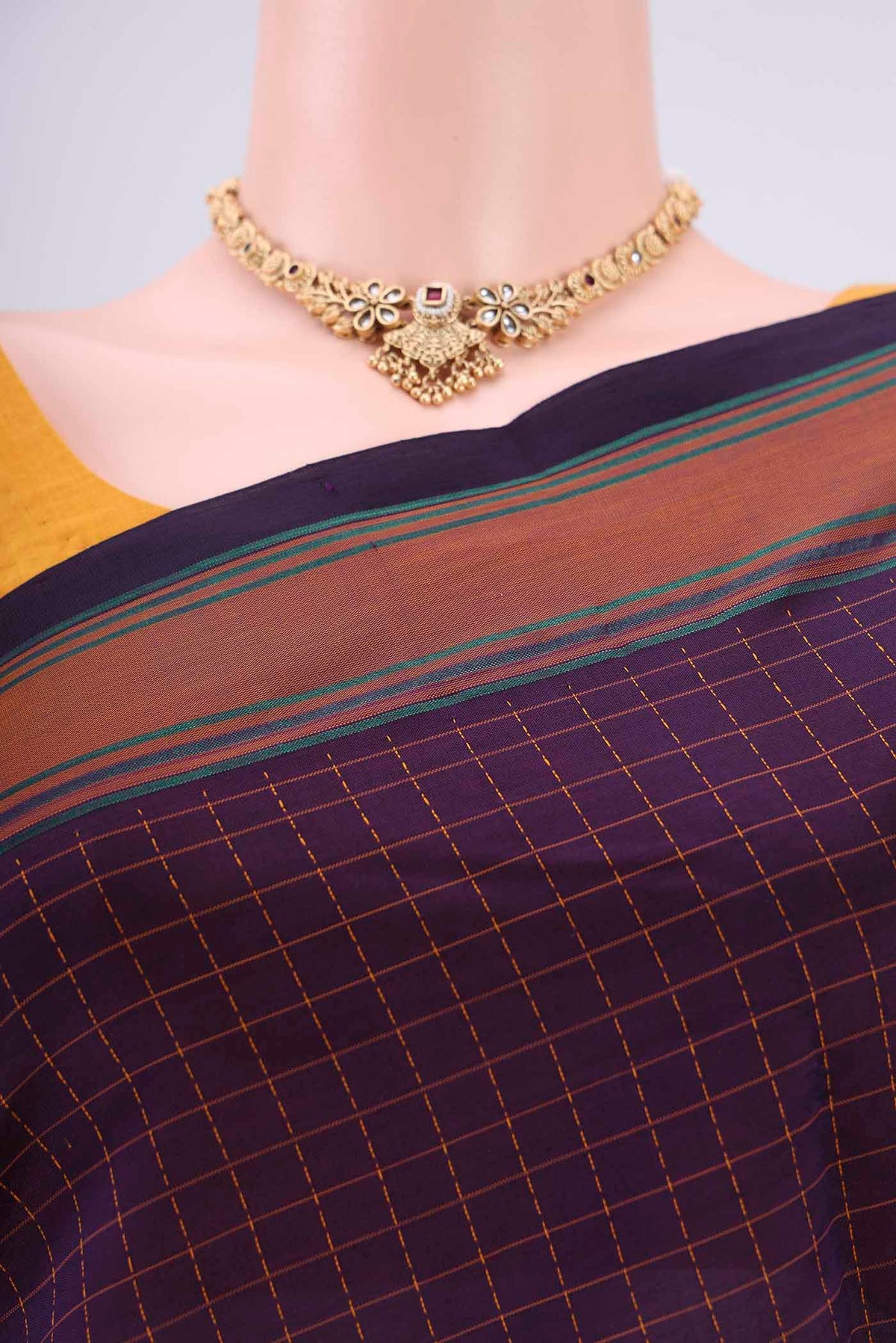 Border image of Purple Blended Poly Cotton Saree with Checked design on the body and Thread Border. 
