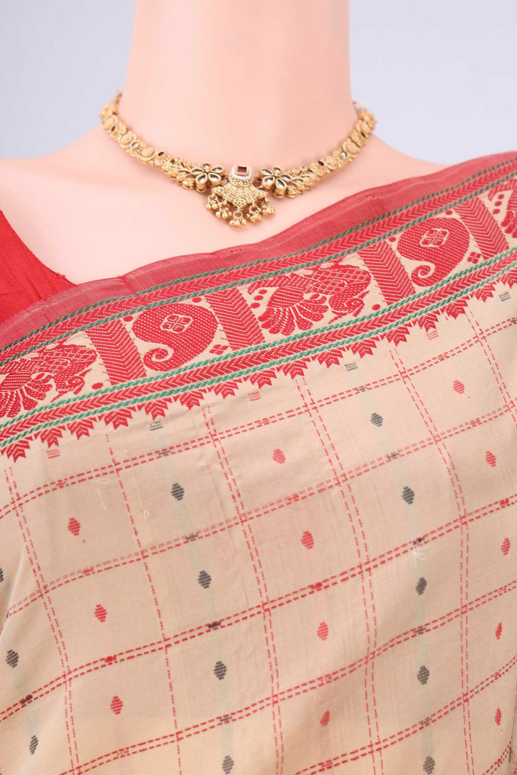 Border image of Beige Blended Poly Cotton Saree with Checked design on the body and Thread Border. 
